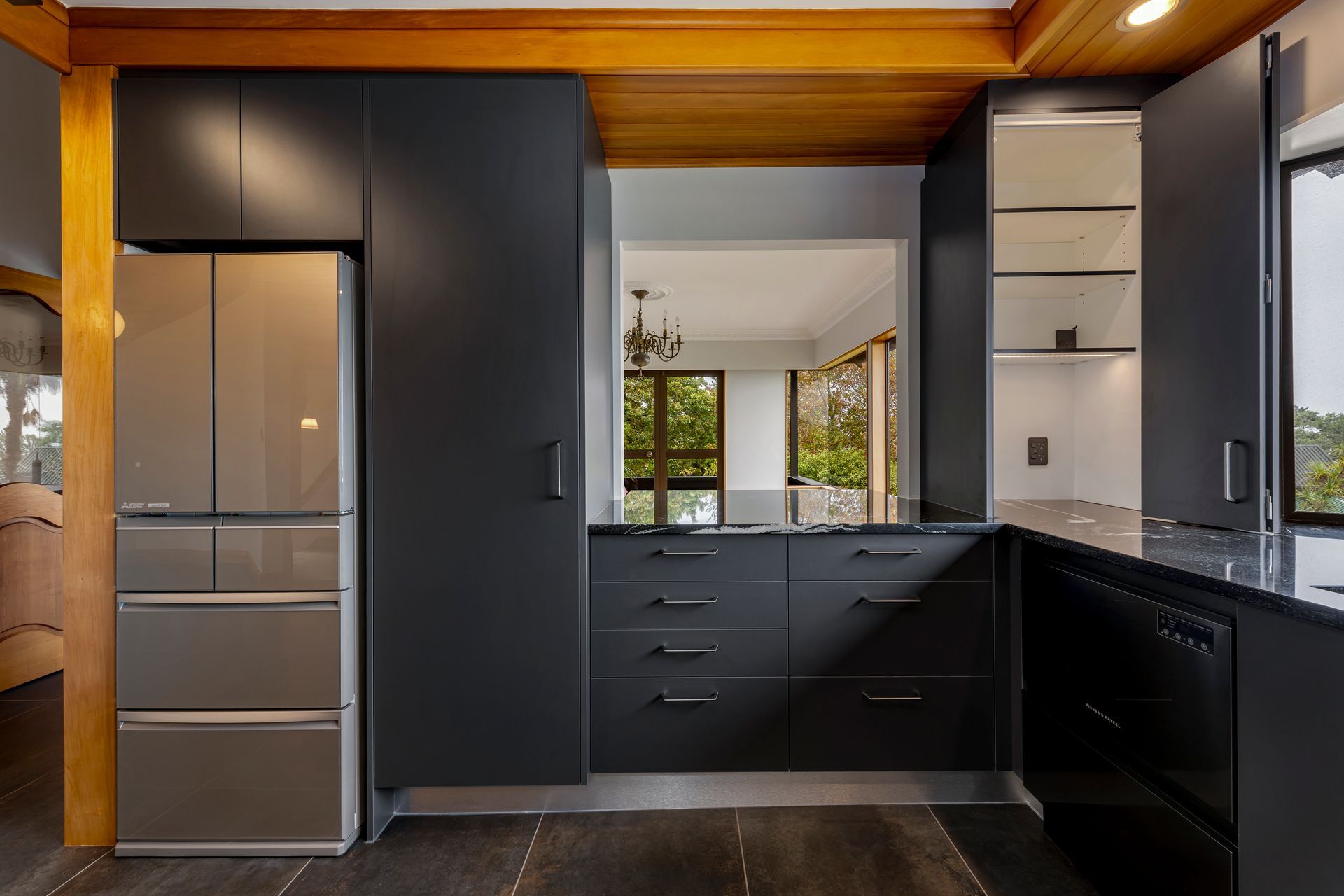 This open-plan layout encourages connection while keeping the mess (and stress) hidden away.