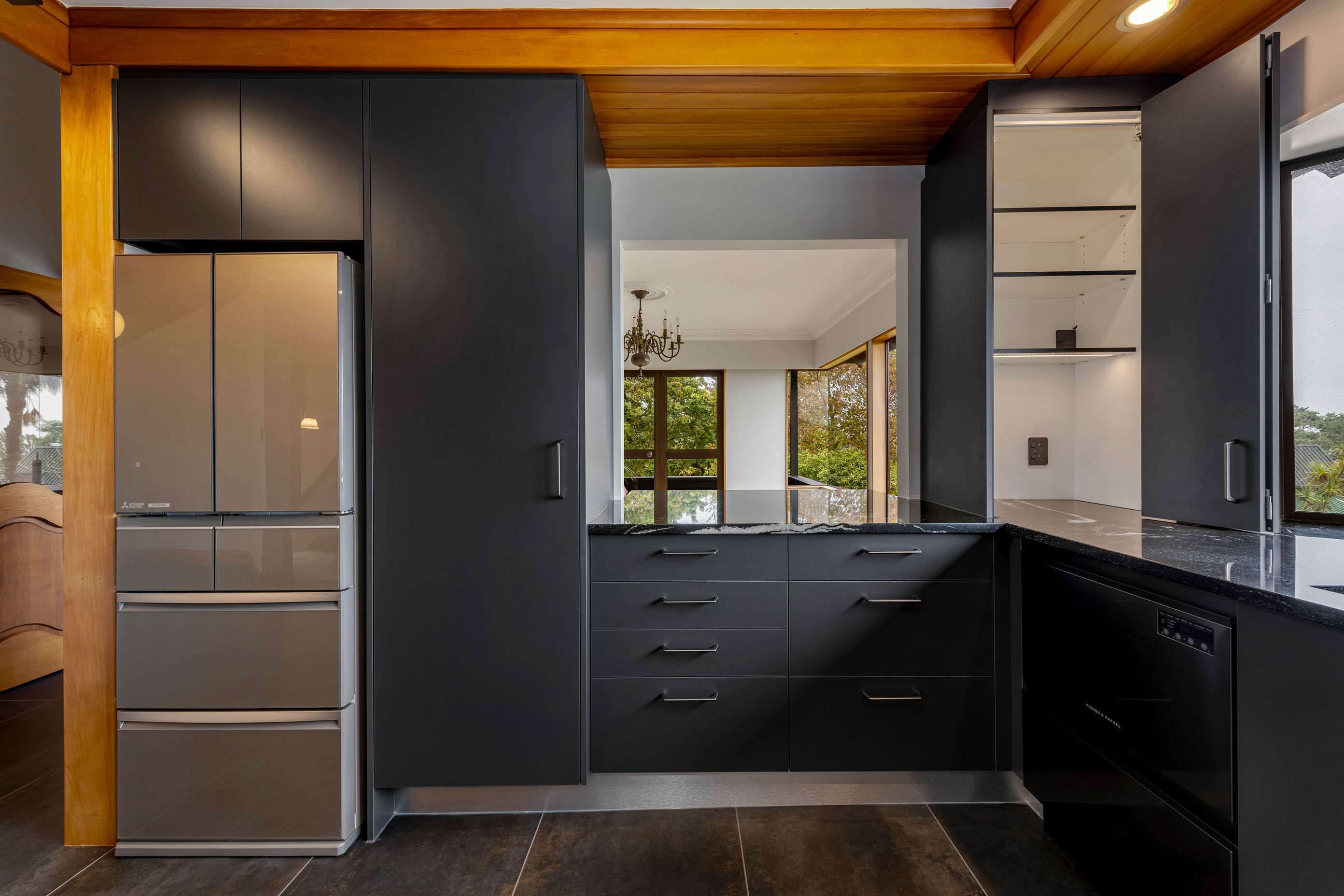 This open-plan layout encourages connection while keeping the mess (and stress) hidden away.