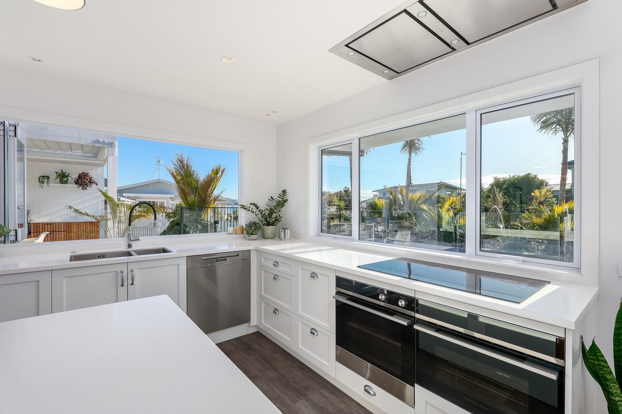 The owners worked closely with Nelson kitchen designer, Fie Vidar to ensure both the kitchen and landscape designs were cohesive.