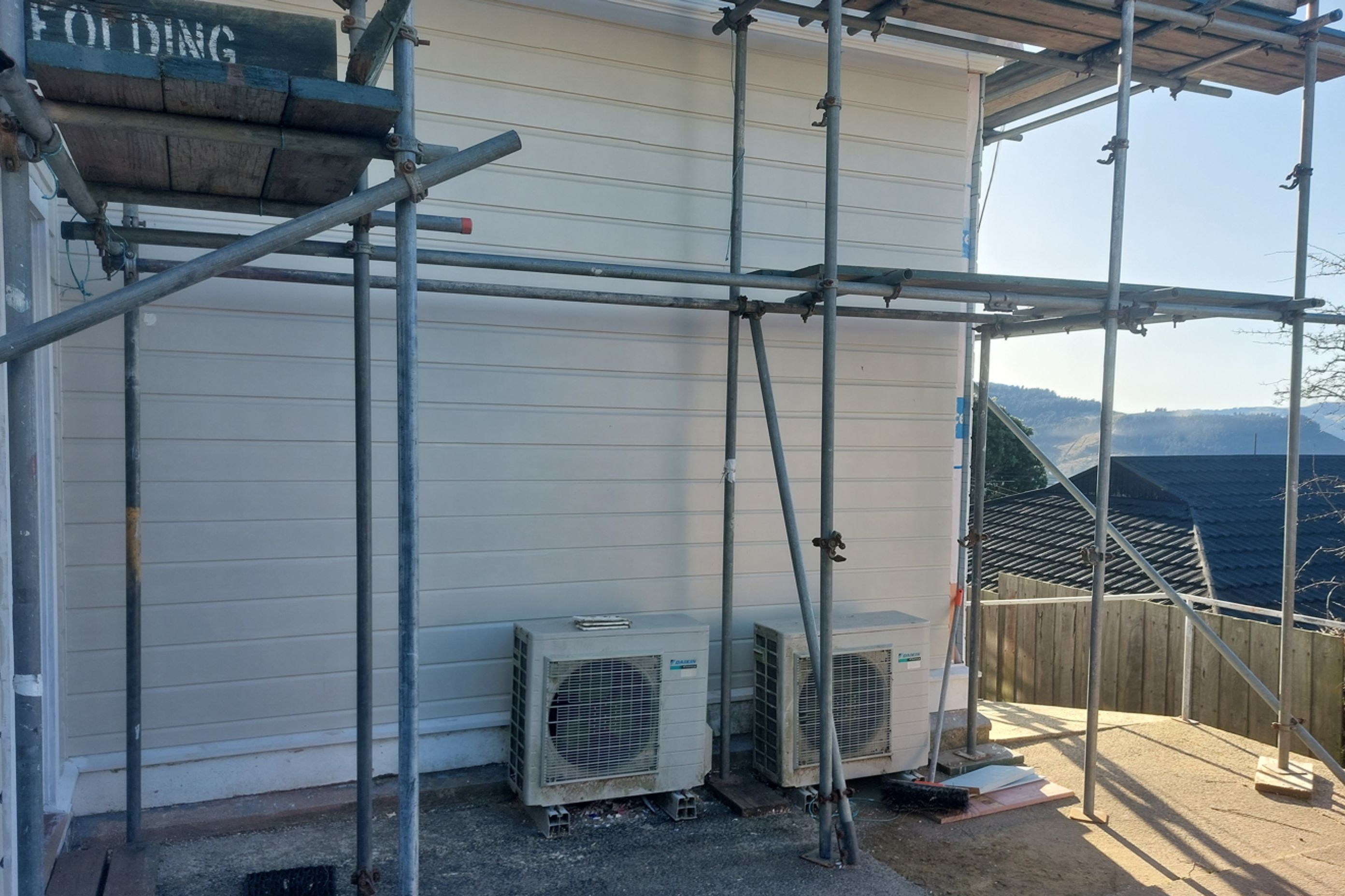 A28-9-Fifield-St-Roslyn-Dunedin-Completion-of-the-weatherboard-installation-and-repairs-at-the-back-of-the-house-JDBuilders.jpg
