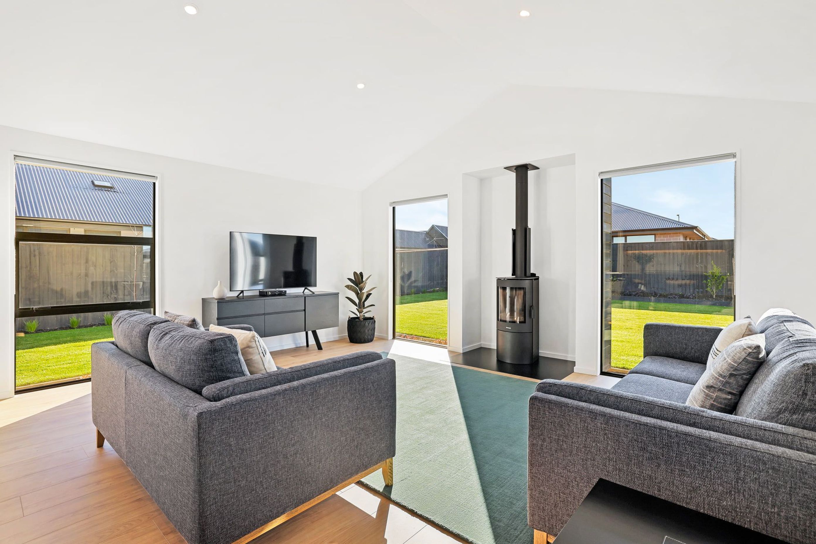 Supply and installation of Masport Akaroa logfire.  Photo credit Homes by Parklane