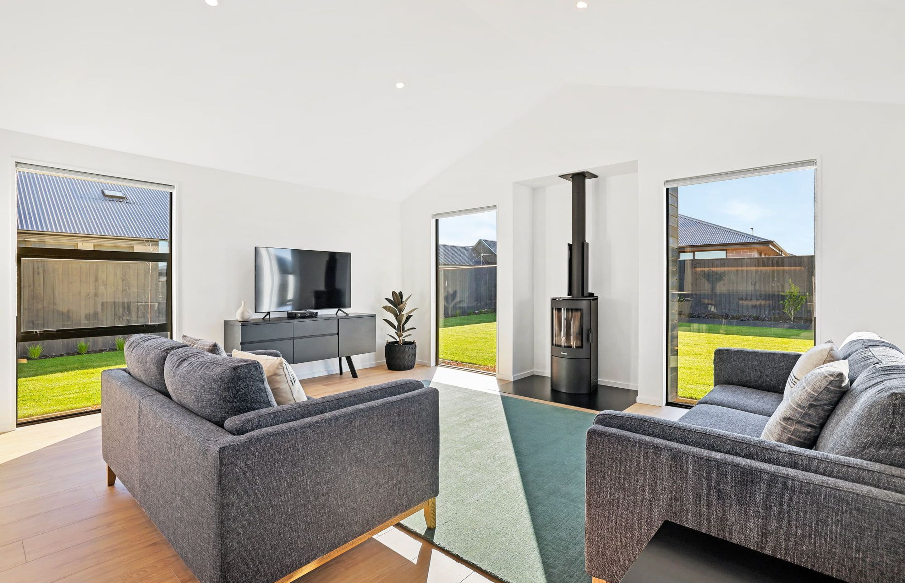 Supply and installation of Masport Akaroa logfire. Photo credit Homes by Parklane