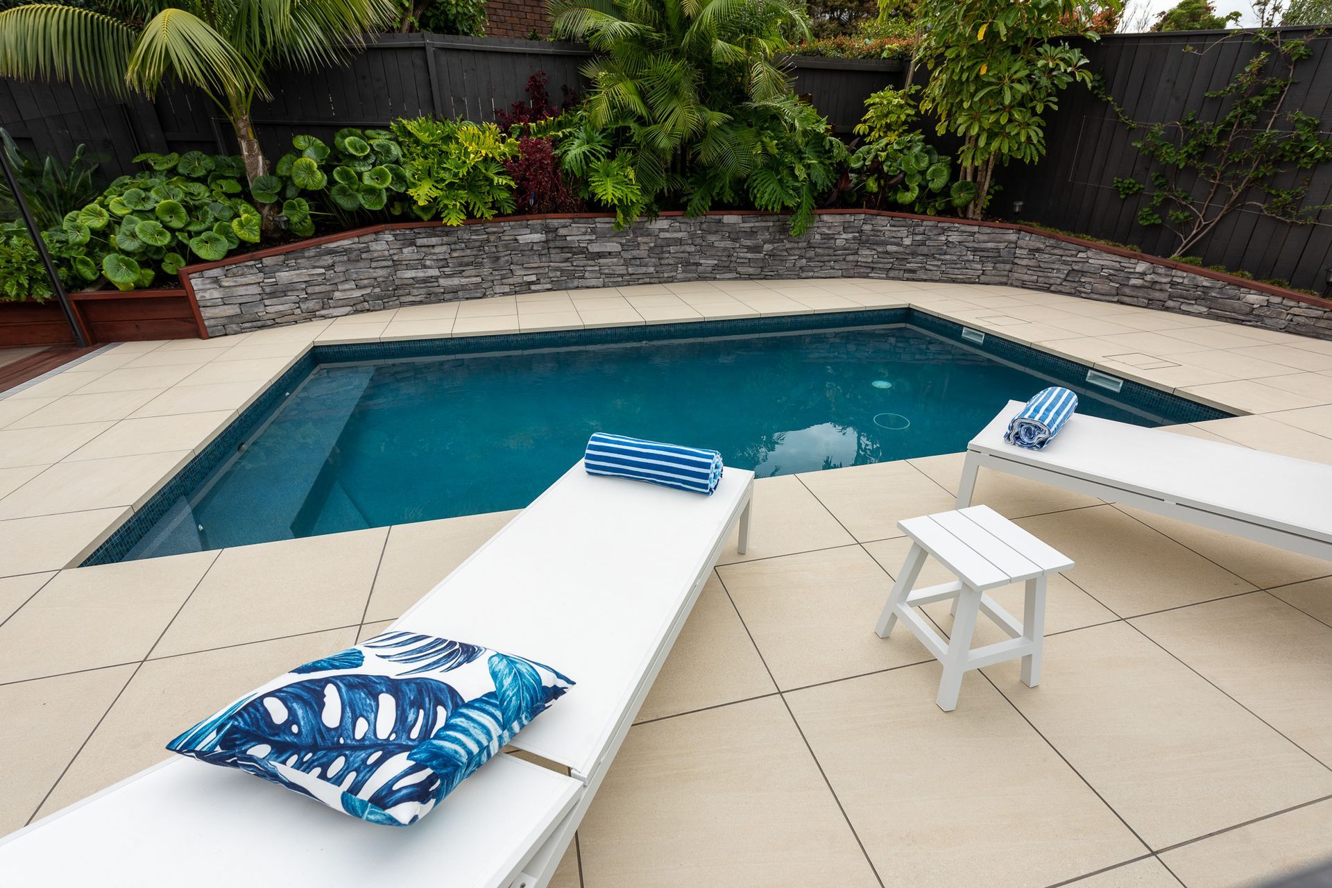 The newly renovated pool area complements the existing garden area well.