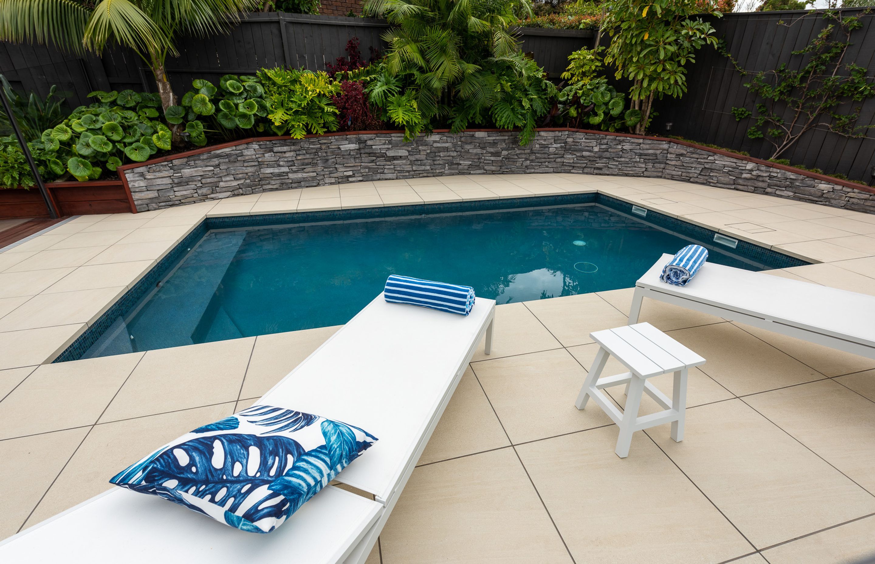 The newly renovated pool area complements the existing garden area well.