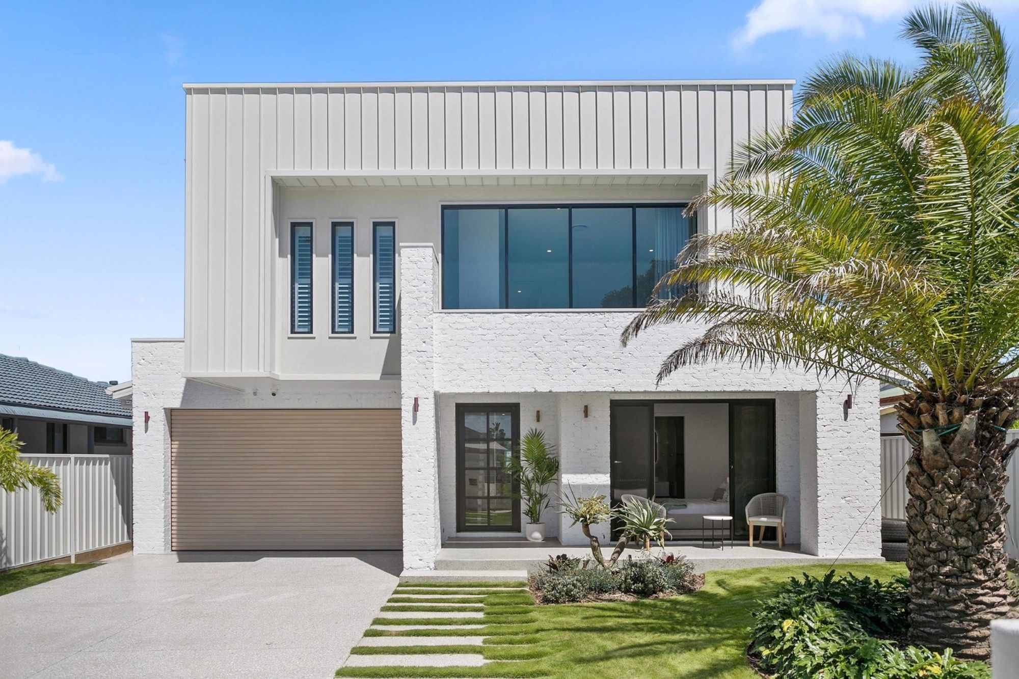 CJB-Metal-Roofing-Custom-Deco-Batten-Sectional-Door-in-Surfmist-DAY.jpg