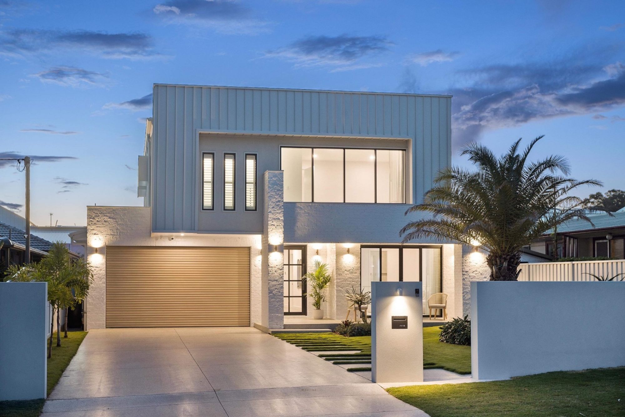CJB-Metal-Roofing-Custom-Deco-Batten-Sectional-Door-in-Surfmist-NIGHT.jpg
