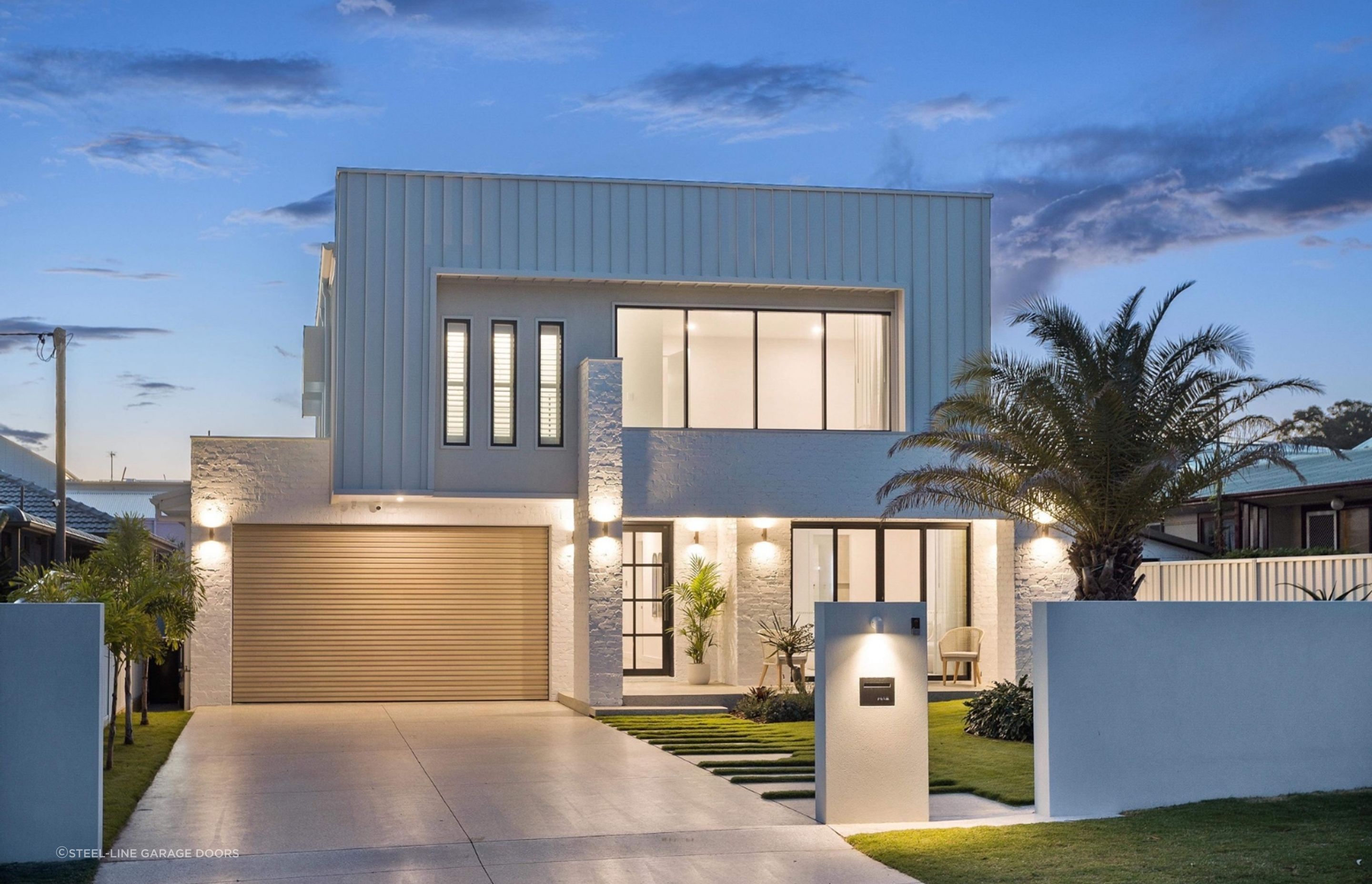 CJB-Metal-Roofing-Custom-Deco-Batten-Sectional-Door-in-Surfmist-NIGHT.jpg