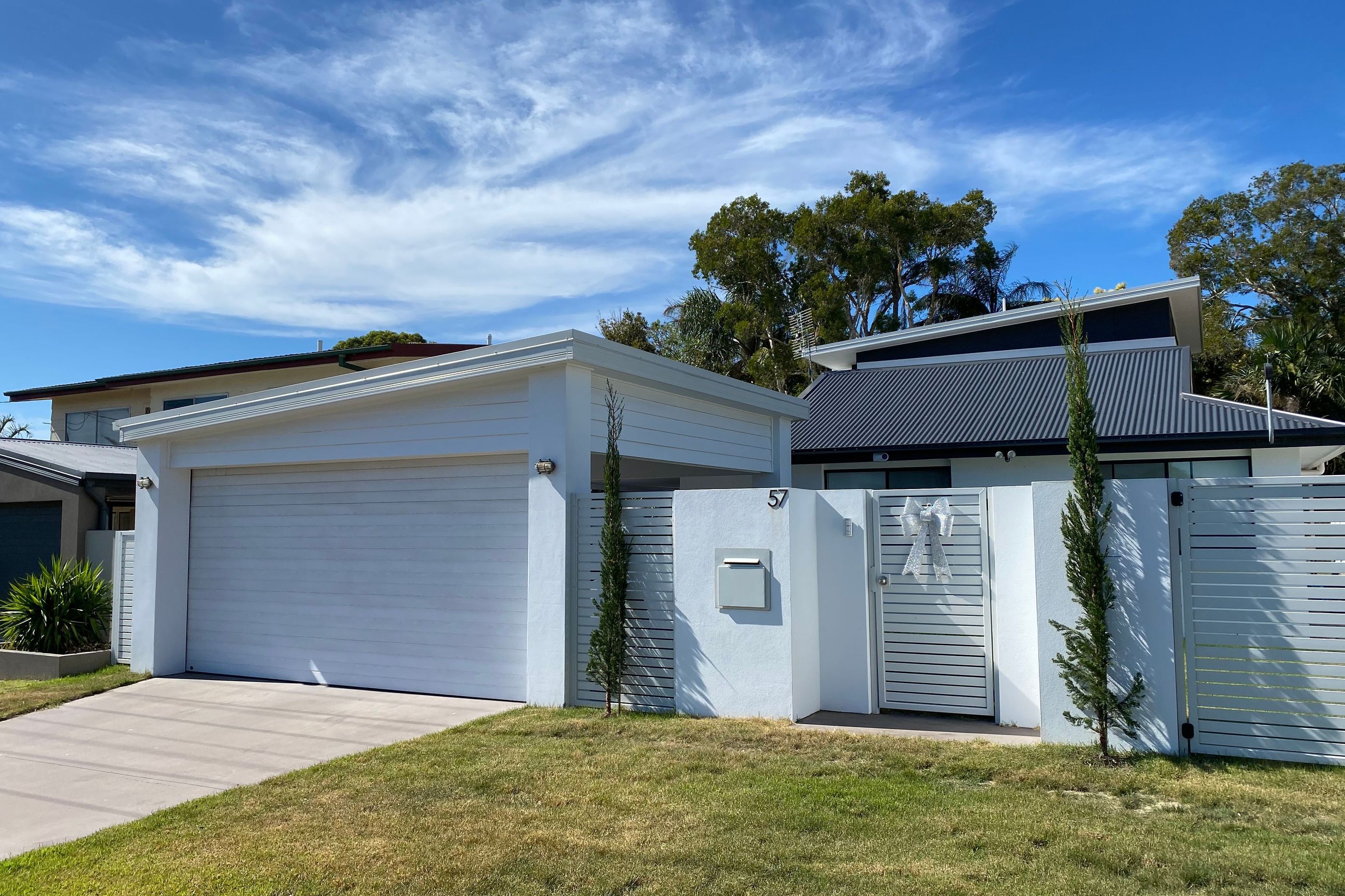 New carport and fence helps to transform street façade