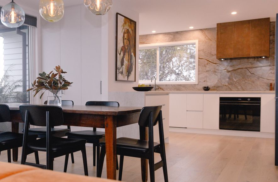 Renovated Kitchen with Coastal Views and Refined Material Palette