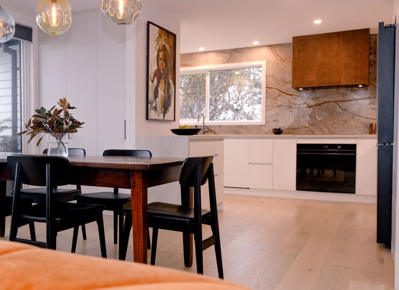 Renovated Kitchen with Coastal Views and Refined Material Palette