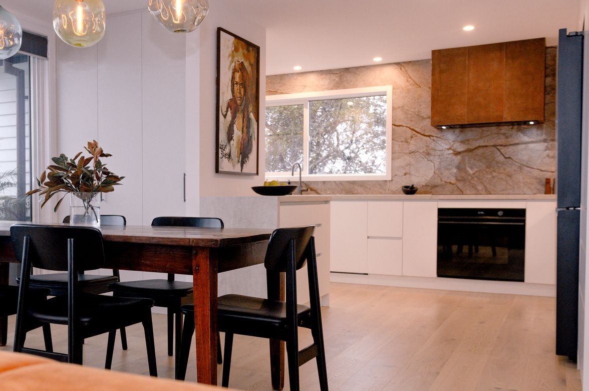 Renovated Kitchen with Coastal Views and Refined Material Palette
