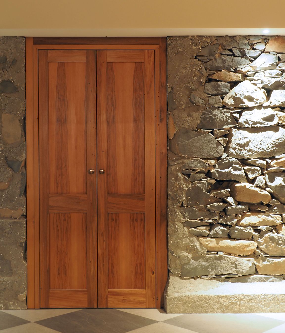 Chaplin-Crooks-ArchitectsWalnut-CottageStone-wall-and-door-made-from-salvaged-timber.jpg