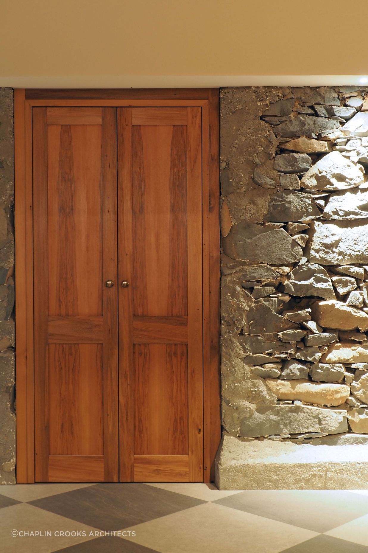 Chaplin-Crooks-ArchitectsWalnut-CottageStone-wall-and-door-made-from-salvaged-timber.jpg