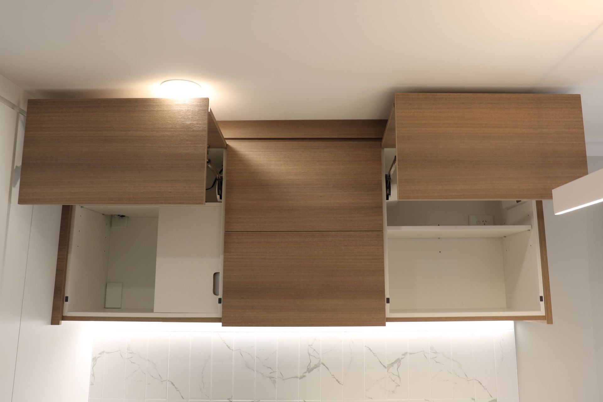 Wall cabinet with integrated Range Hood and LED light