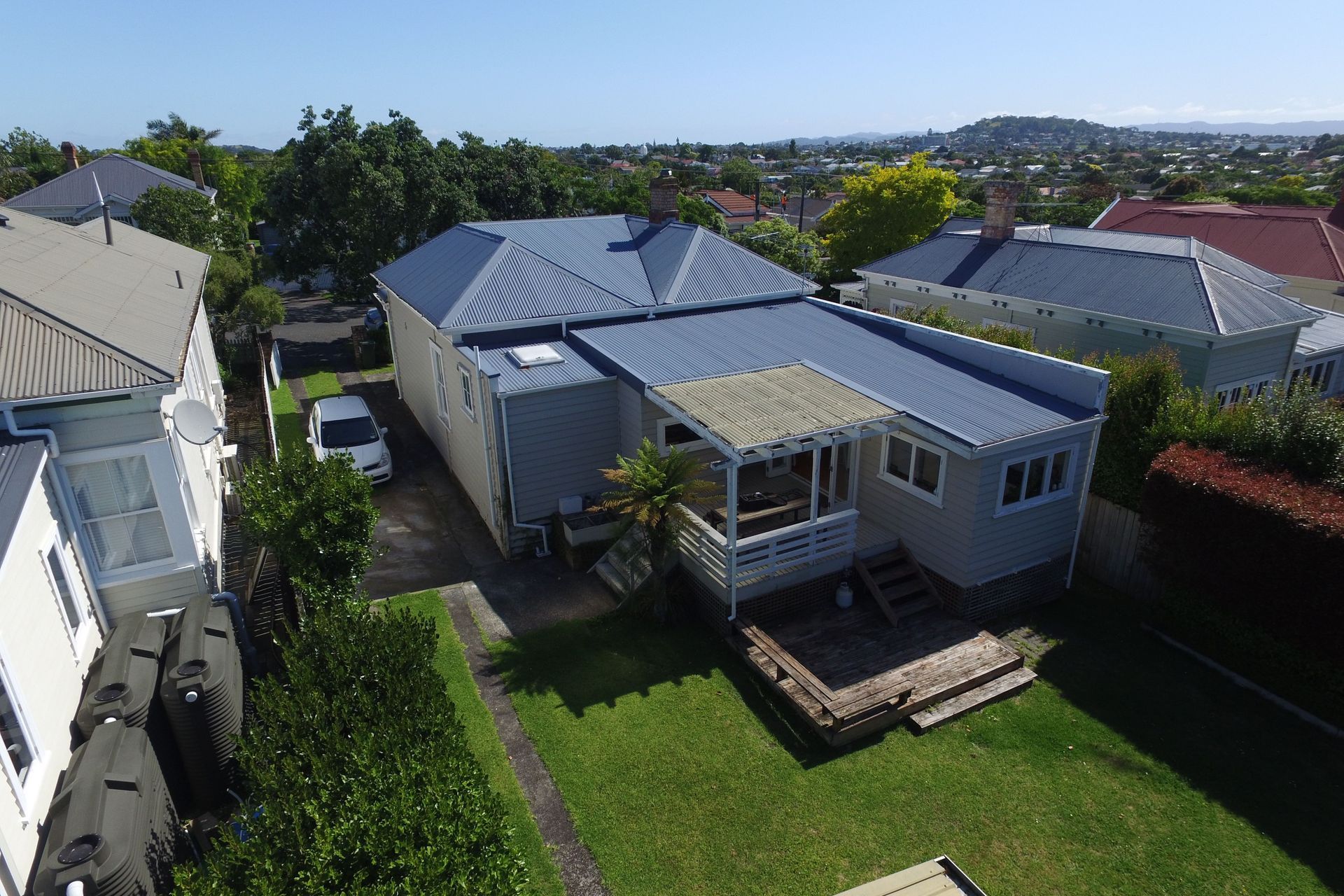 The property prior to renovation showing the previous additions.