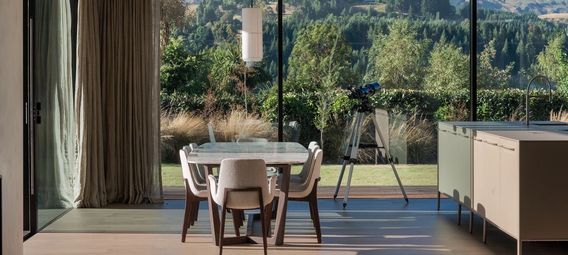 Dining room views to Coronet Peak.  Featuring Poliform dining table and chairs from Studio Italia, Forte flooring oak floors.