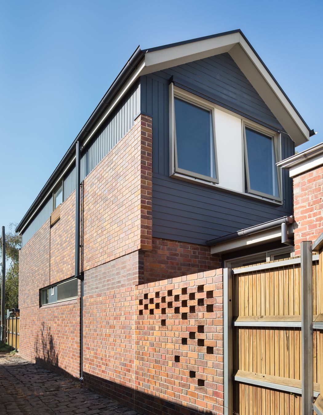 Laneway view of the second storey addition at our Brunswick house.