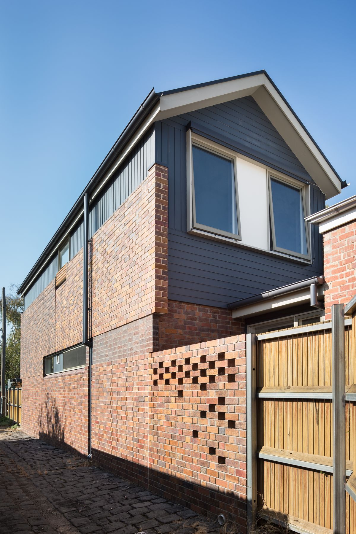 Laneway view of the second storey addition at our Brunswick house.
