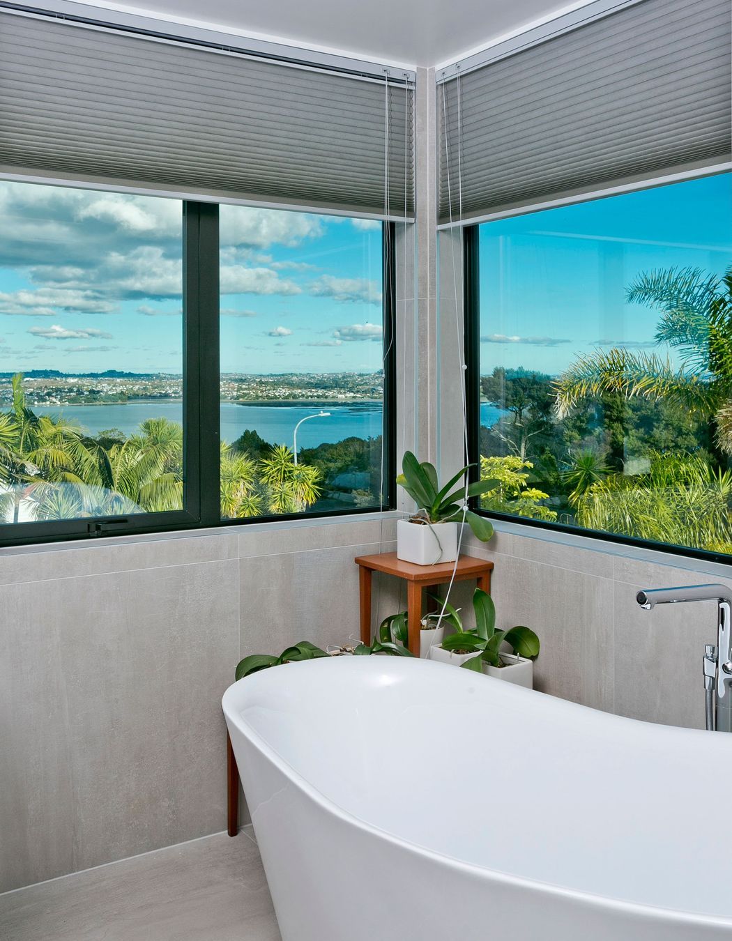 Double aspect windows provide an enviable view back across the harbour, to be enjoyed from the slipper bathtub.