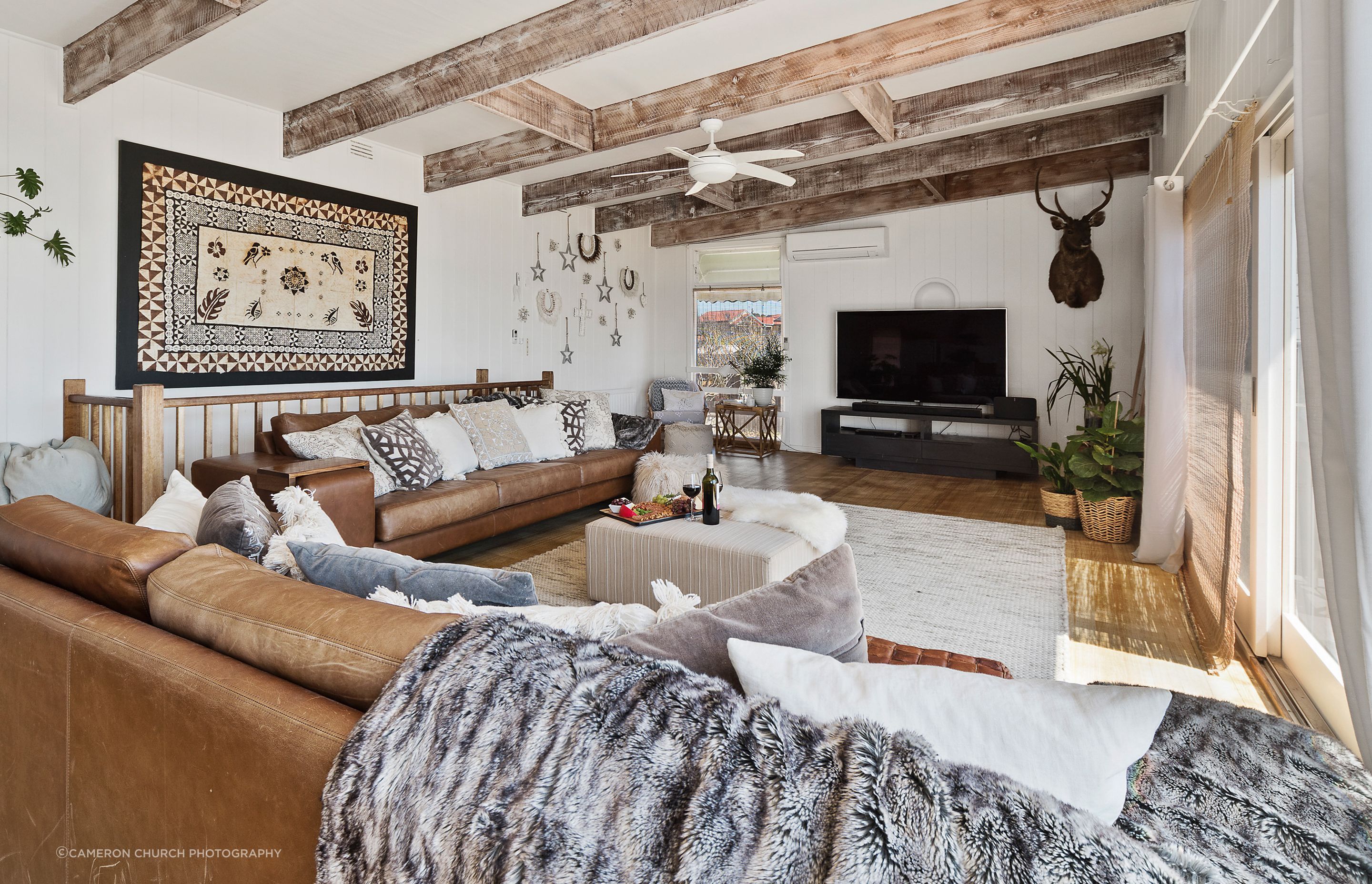 Find seaside serenity in this upstairs living space, joining directly onto the deck with oceanfront views
