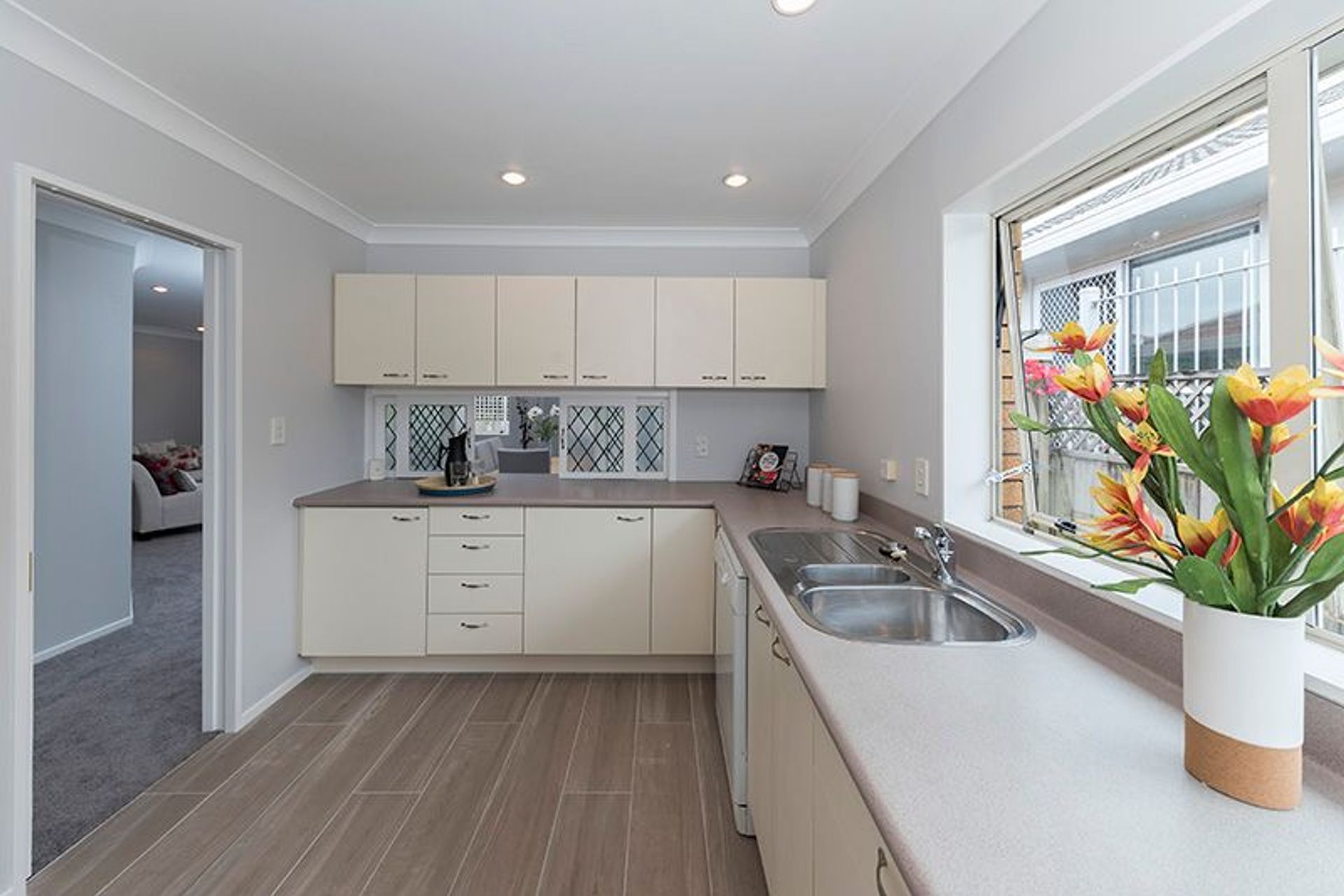 Kitchen - Still in remarkable condition, we modernised this area while retaining the original cabinetry and benchtop