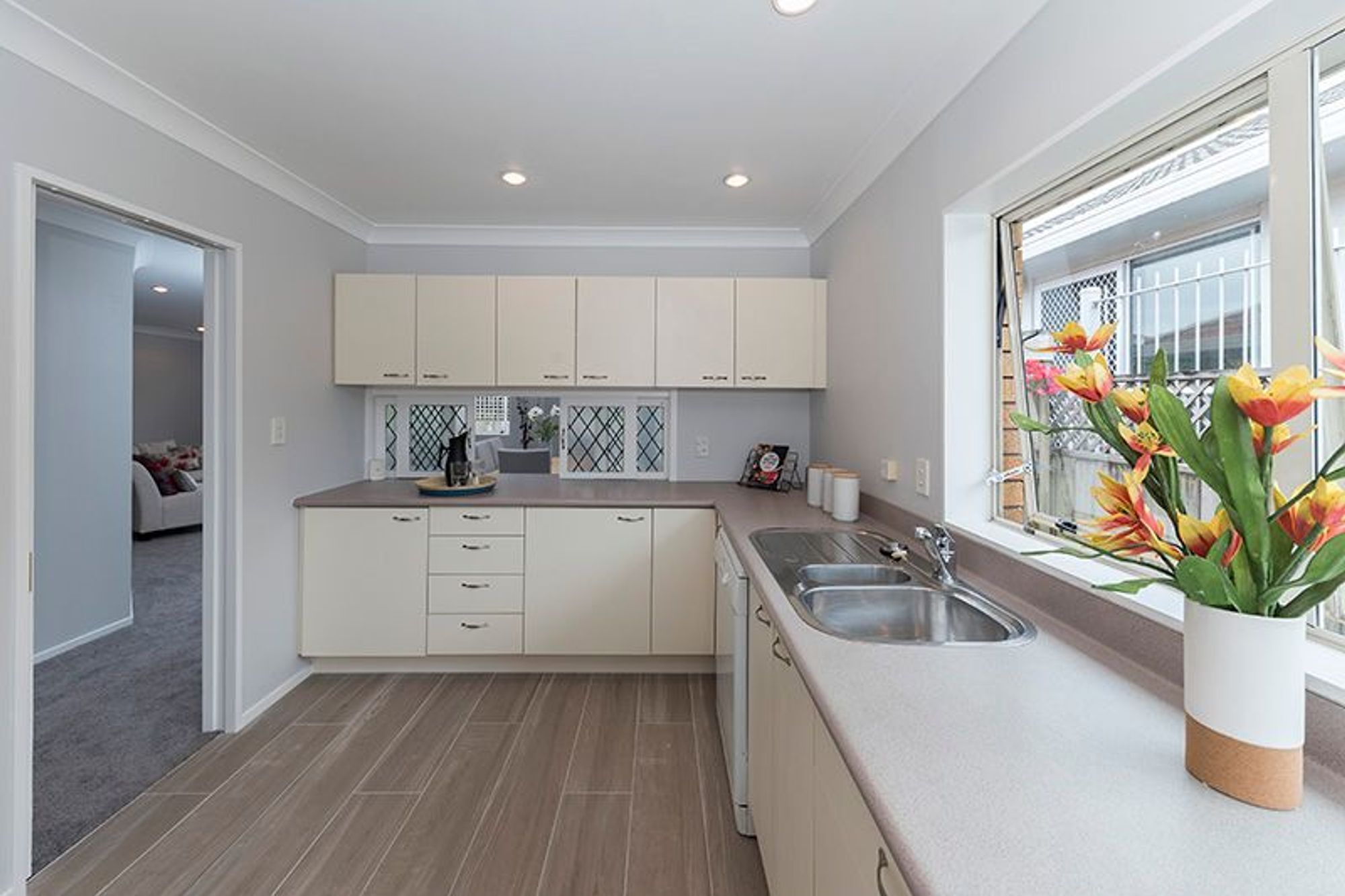 Kitchen - Still in remarkable condition, we modernised this area while retaining the original cabinetry and benchtop