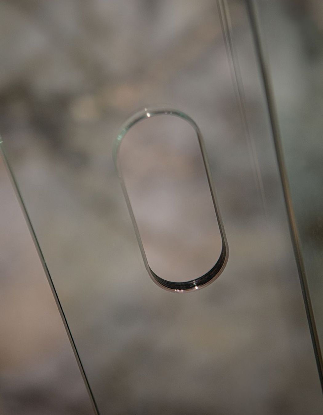 Sleek cut out instead of handles for the shower doors.