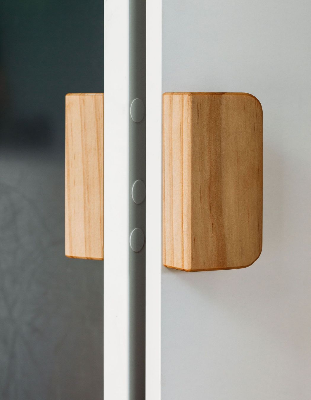 Lovely custom timber pull handles for the pantry.