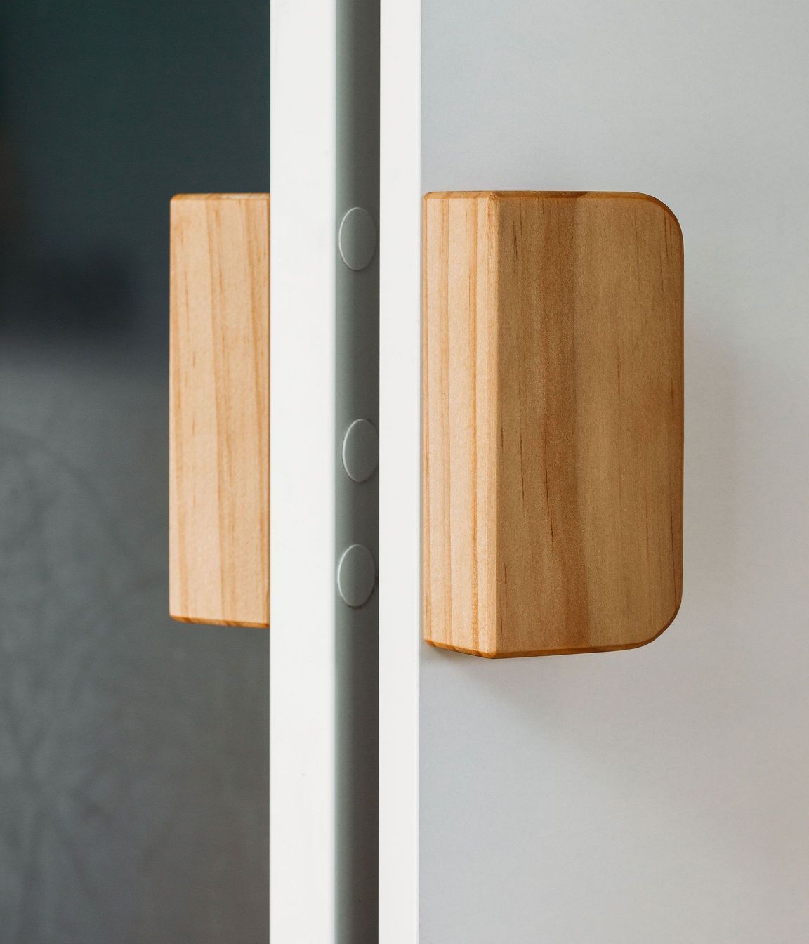 Lovely custom timber pull handles for the pantry.