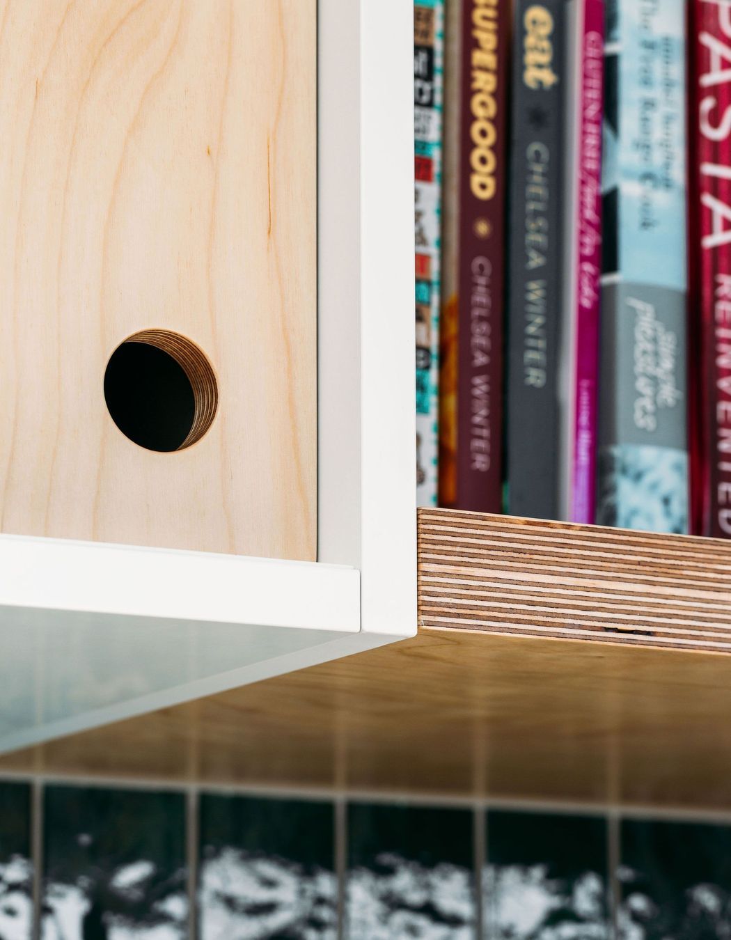 Simple details - plywood and circle pull handles.