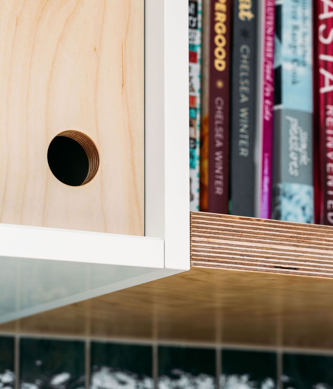 Simple details - plywood and circle pull handles.