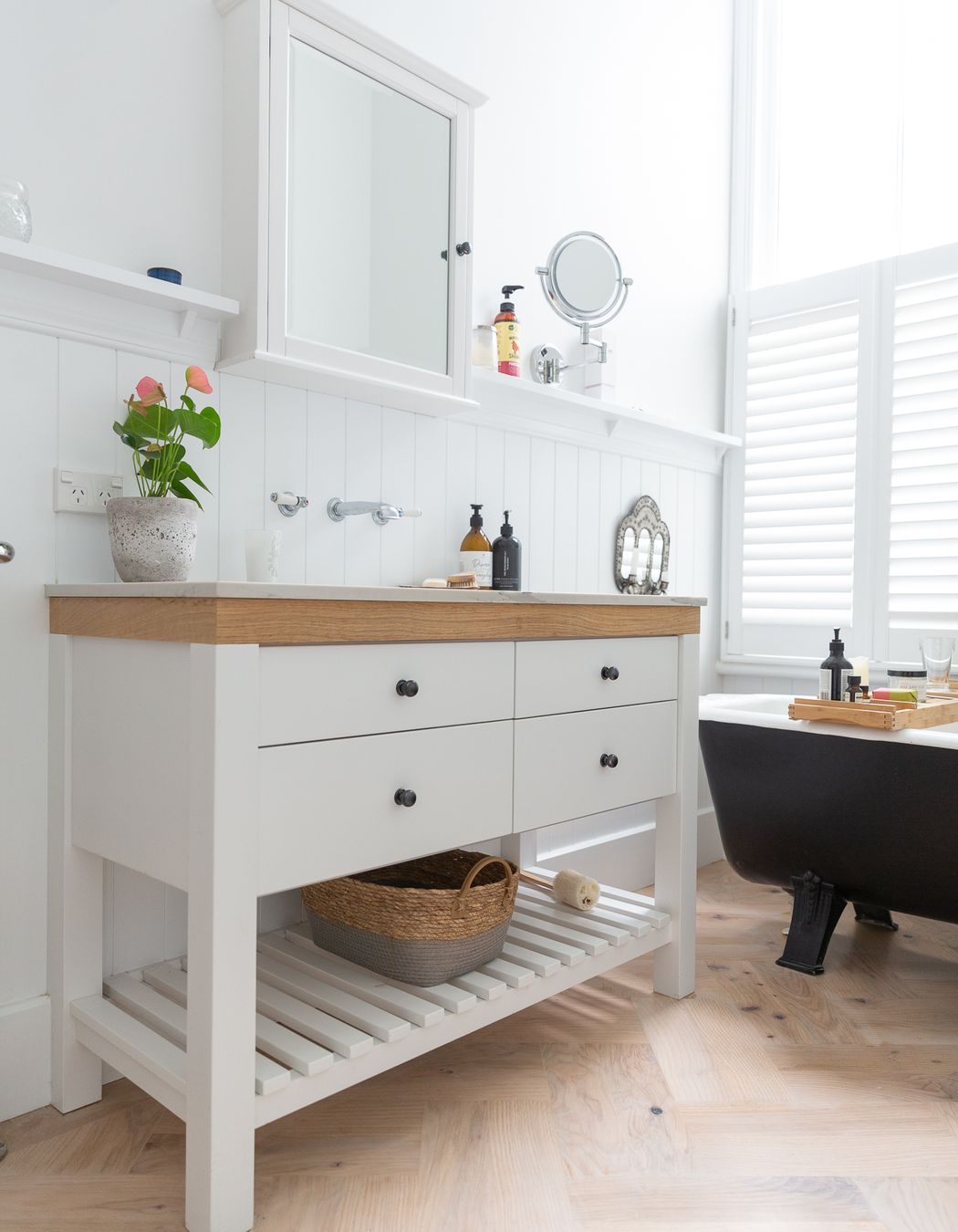 Stylish bathroom cabinetry to complement roll top bath