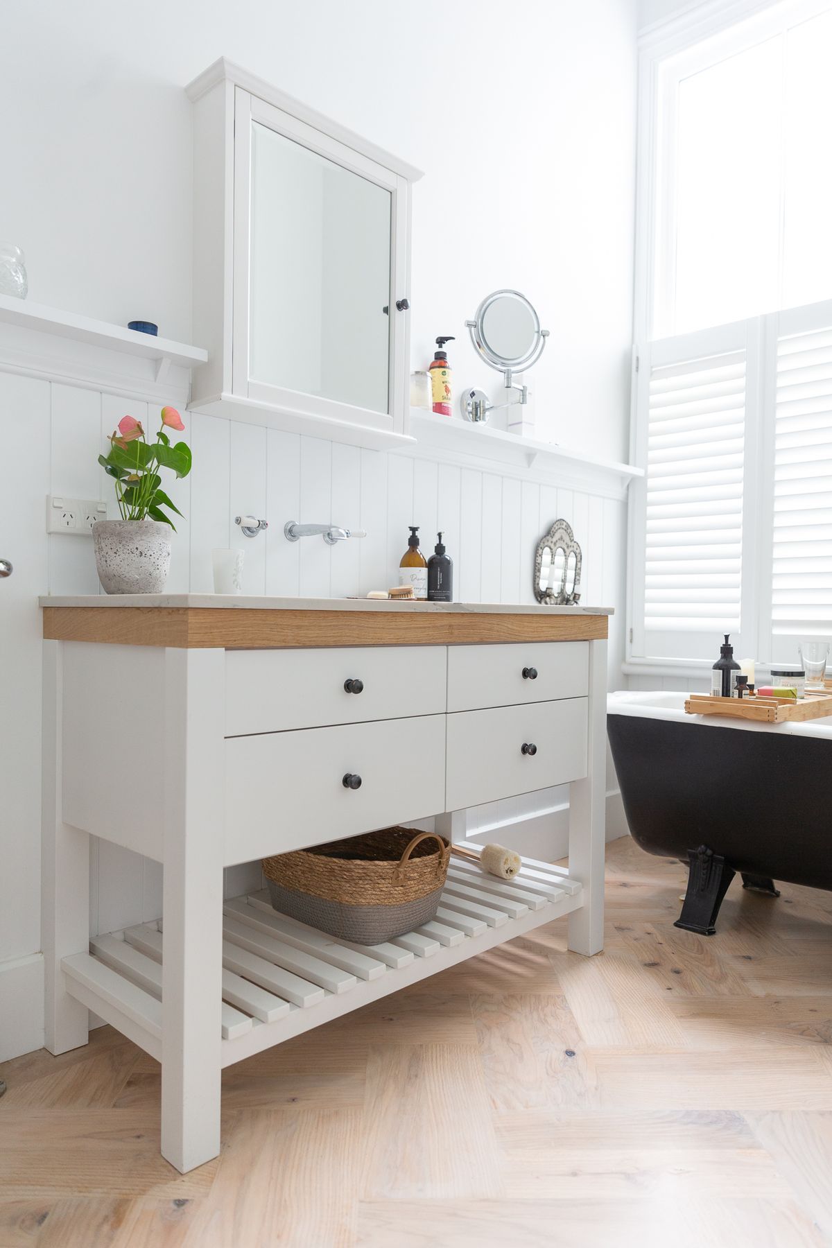 Stylish bathroom cabinetry to complement roll top bath