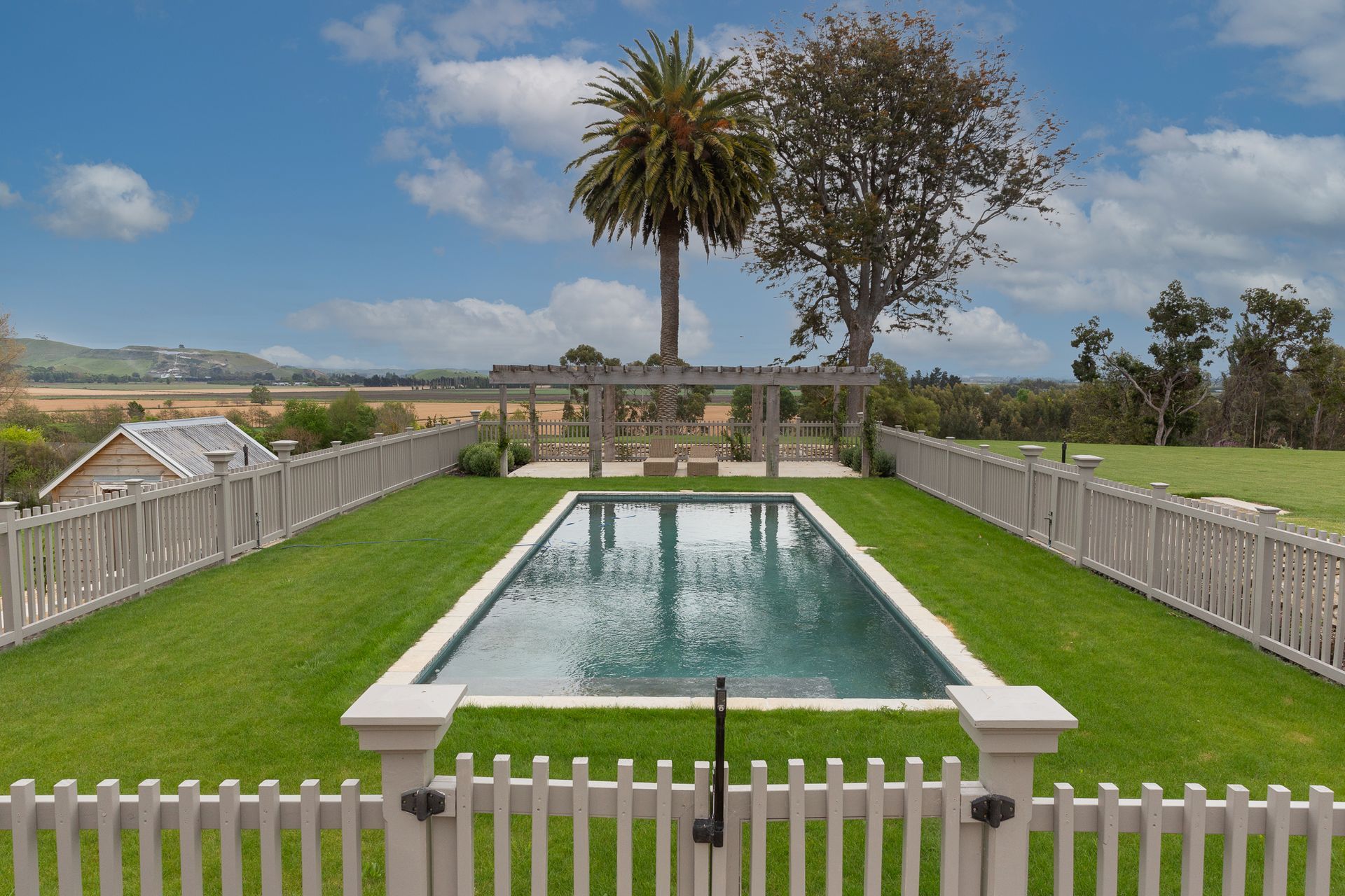 Gates and fences around pool, functional, yet still beautiful.
