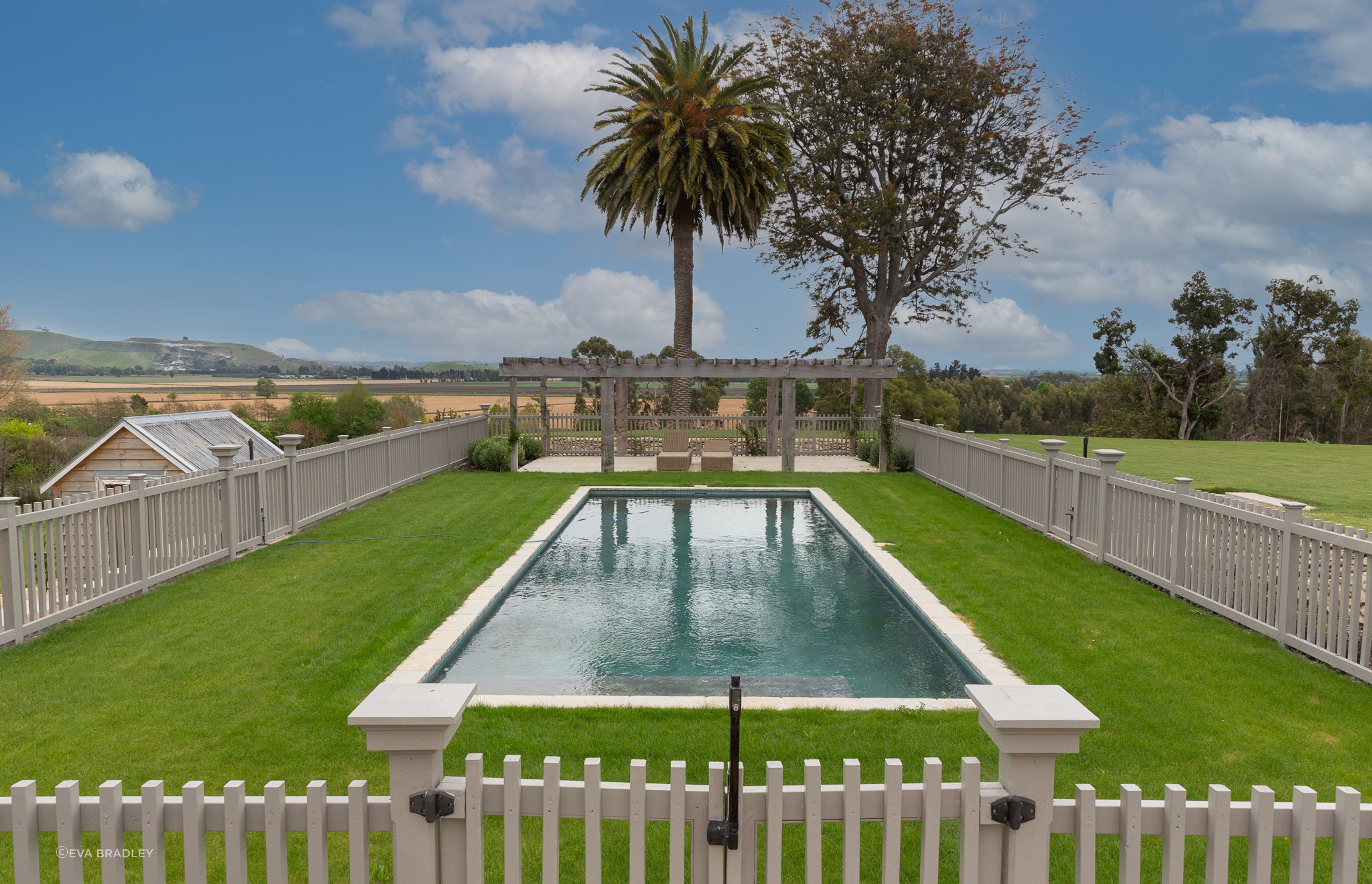 Gates and fences around pool, functional, yet still beautiful.