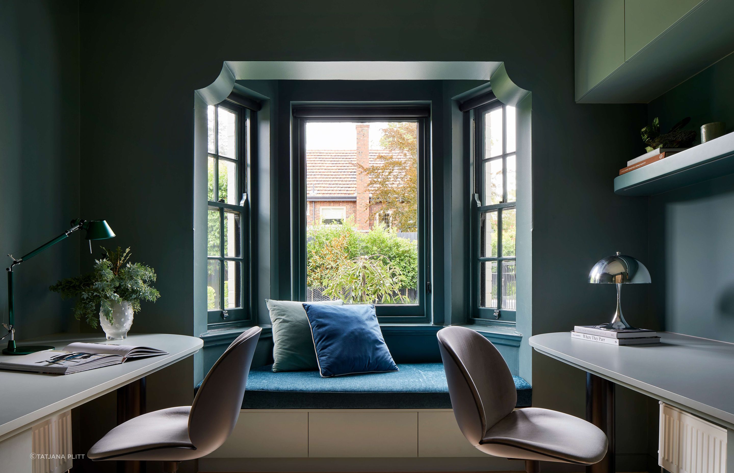 Home study in a 1930’s Spanish Mission renovation, with a reimagined art deco inspired design. Featuring a dark green garden aesthetic with jeweled green wall colour in Dulux Coriole. Arched doors and windows and jeweled coloured chairs contribute to an overall rich colour scheme. Located in Melbourne, see more from our Arch Deco Project.