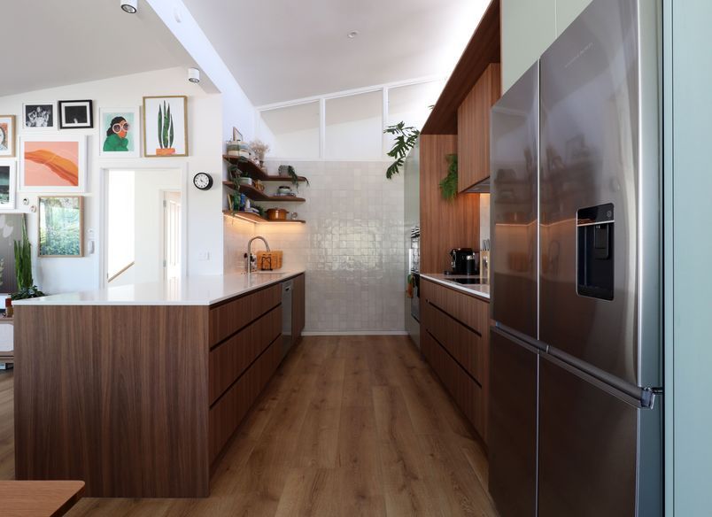 Family-Centric Renovation with Sage Green and Woodgrain
