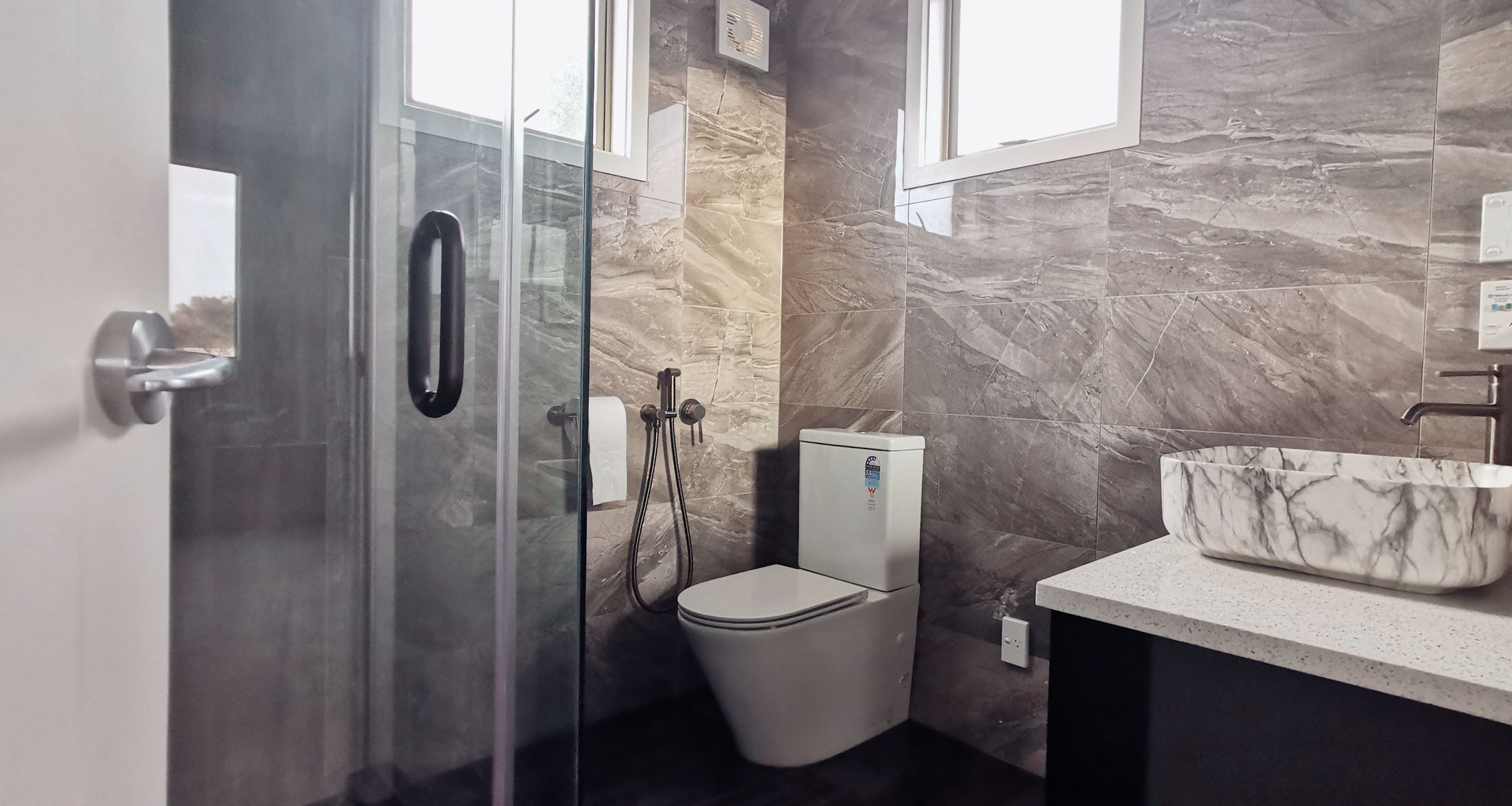 Sleek And Stylish: A Modern Ensuite Renovation banner