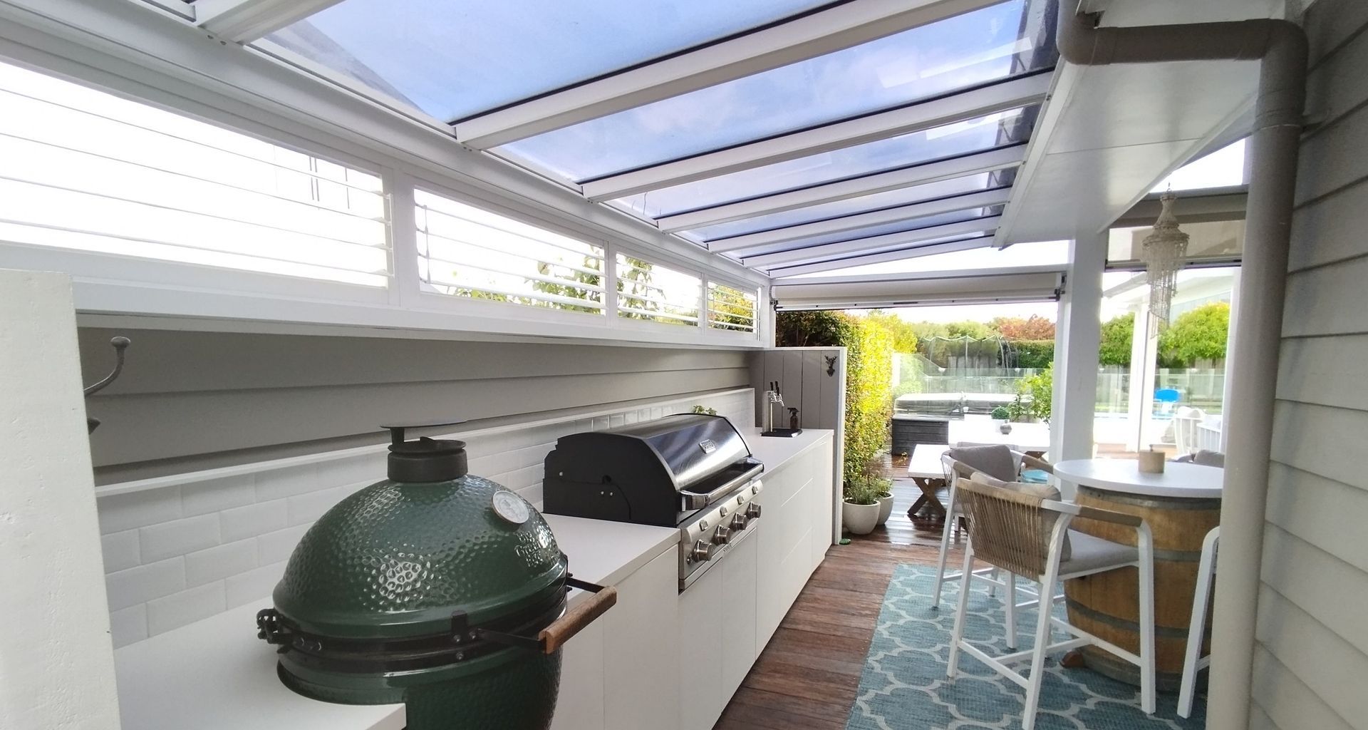 Flat Rectangle Canopy With Ziptrak® Outdoor Blinds And Fixed Louvre Panels In Karaka banner