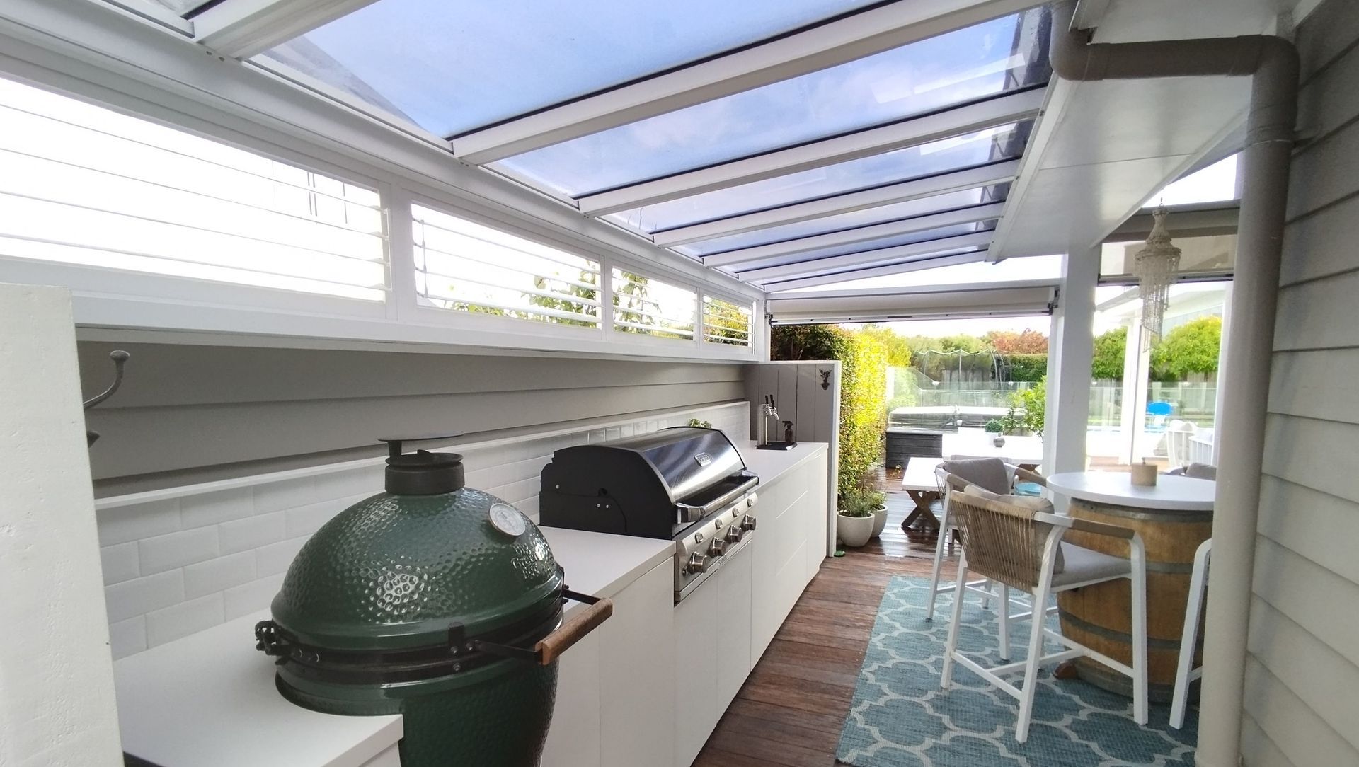 Flat Rectangle Canopy With Ziptrak® Outdoor Blinds And Fixed Louvre Panels In Karaka banner