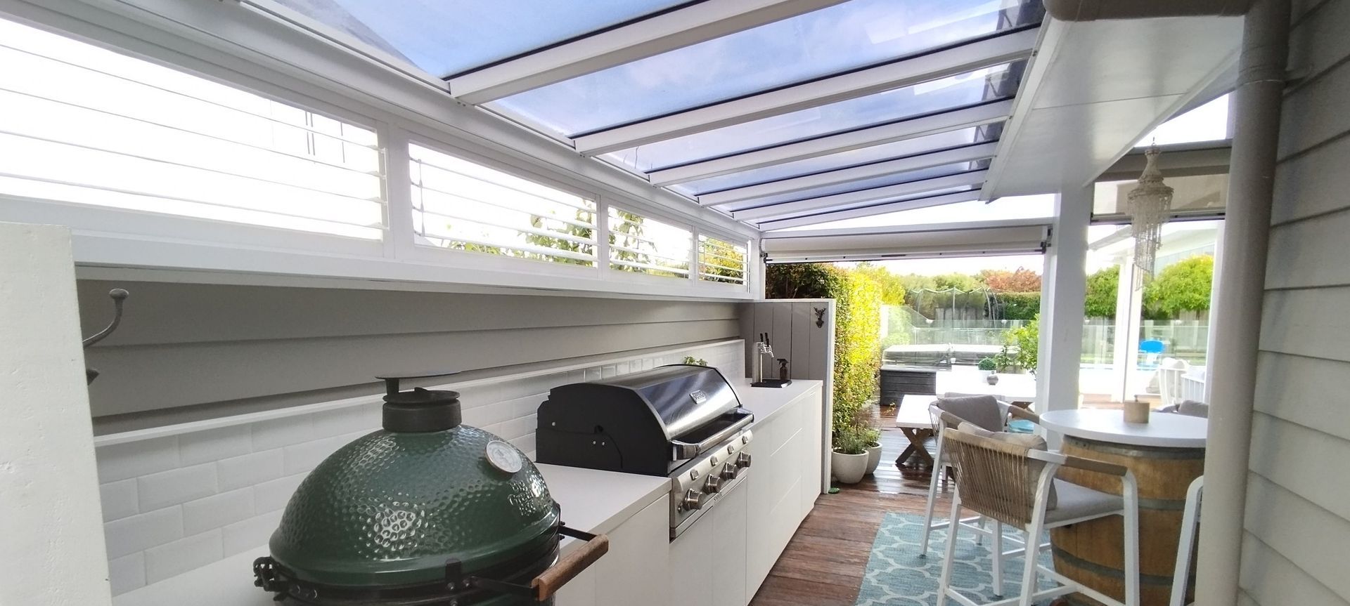 Flat Rectangle Canopy With Ziptrak® Outdoor Blinds And Fixed Louvre Panels In Karaka banner