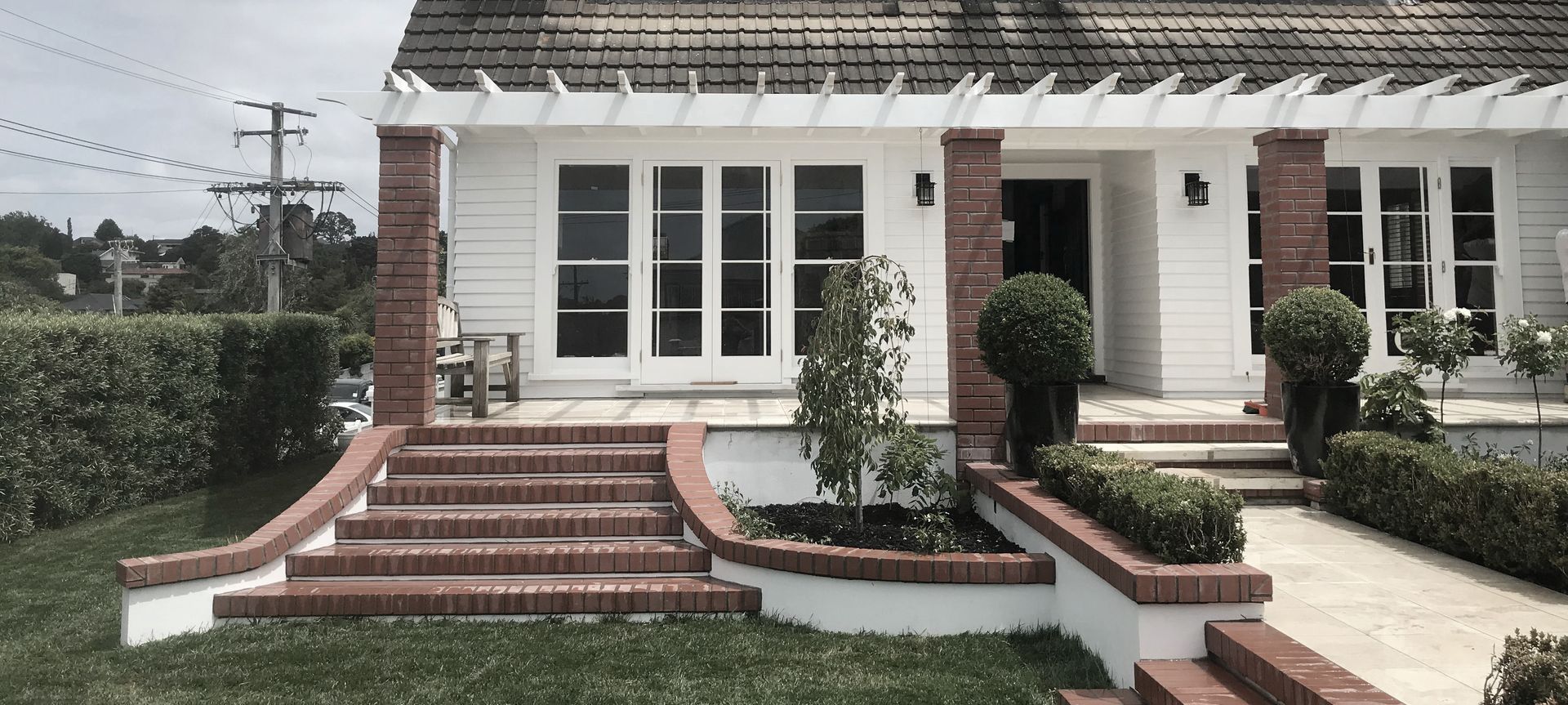 English Rose, Remuera banner