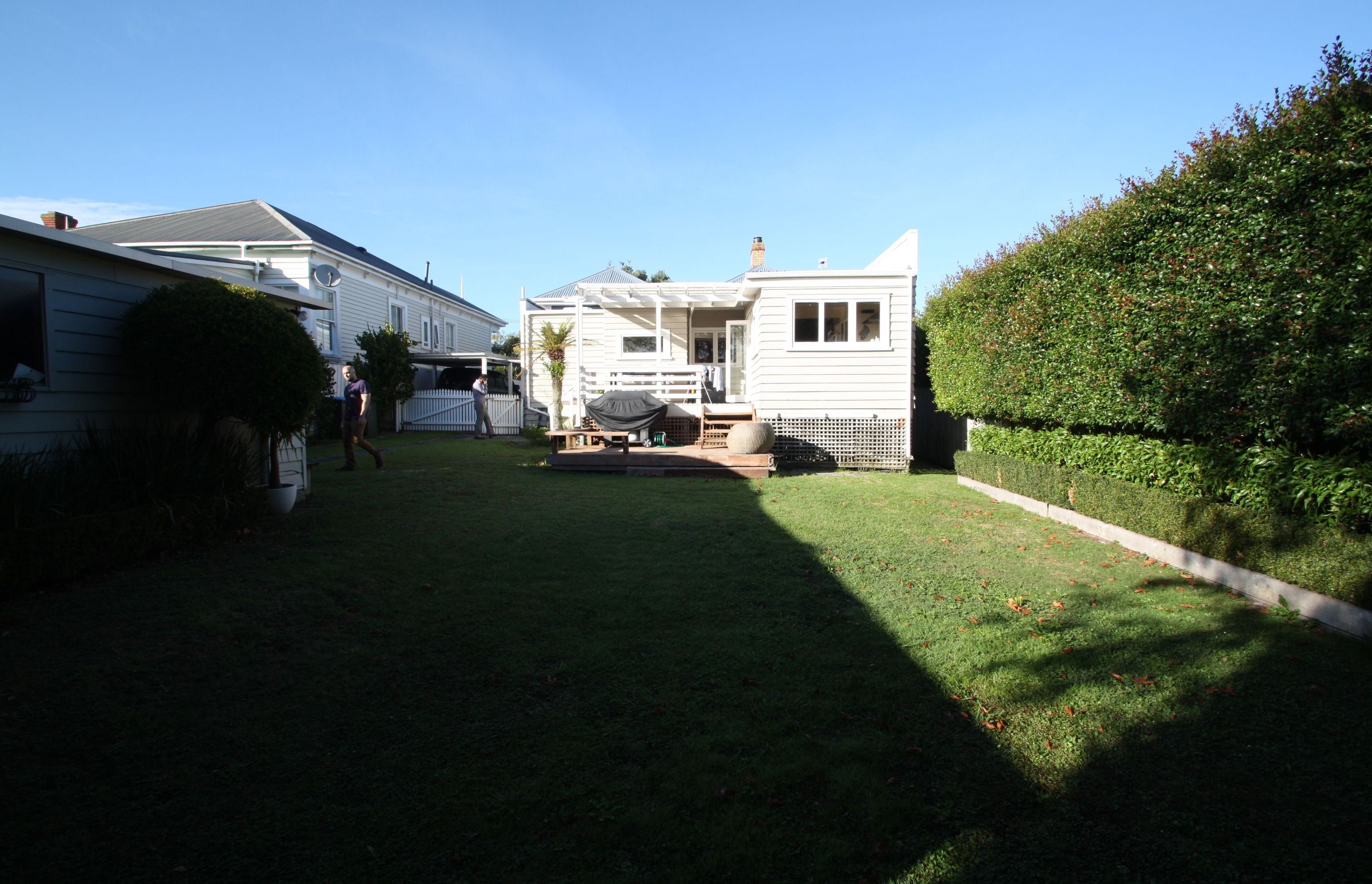 View of the property from the backyard prior to the renovation.