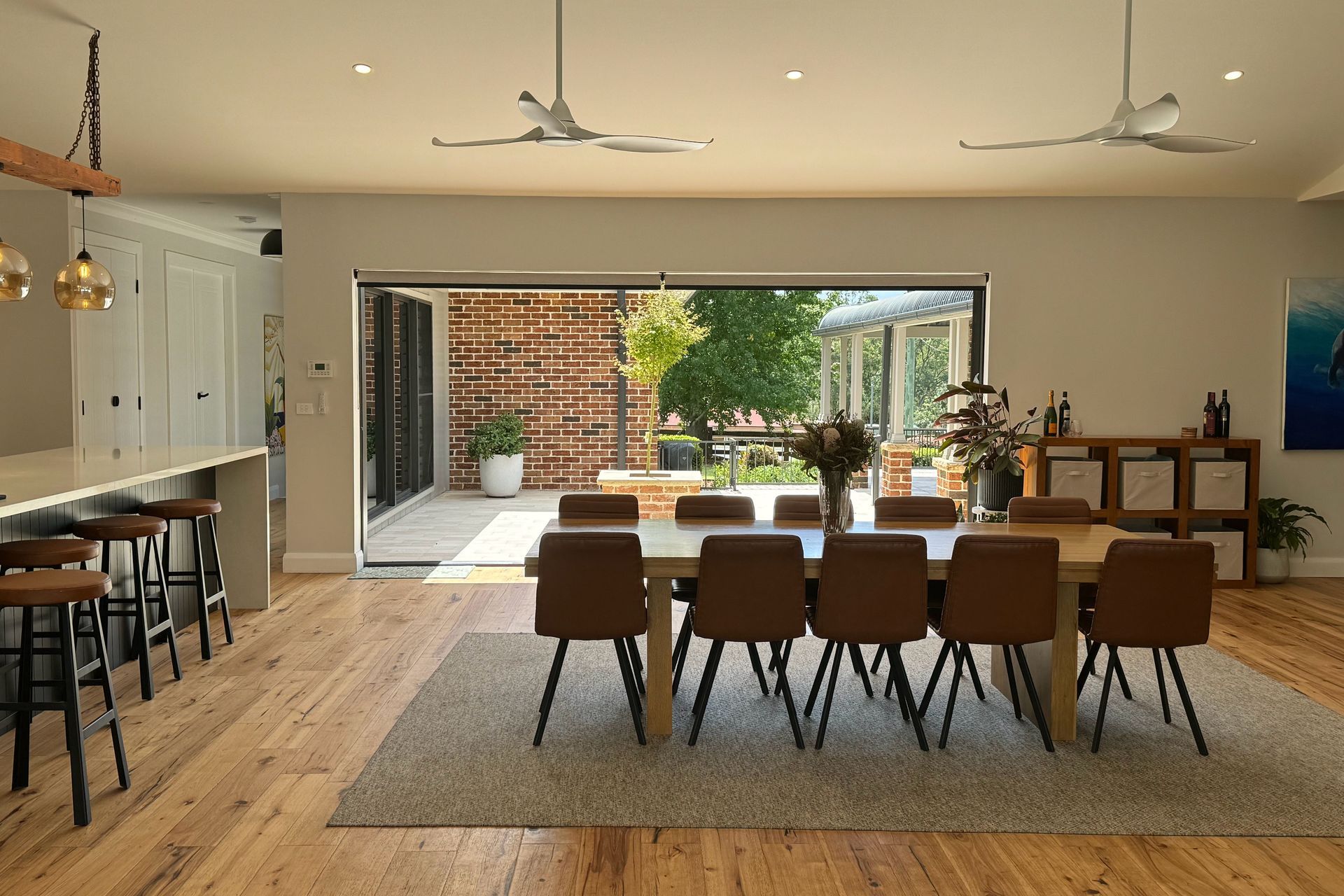 The sun drenches the living space from the winter courtyard.