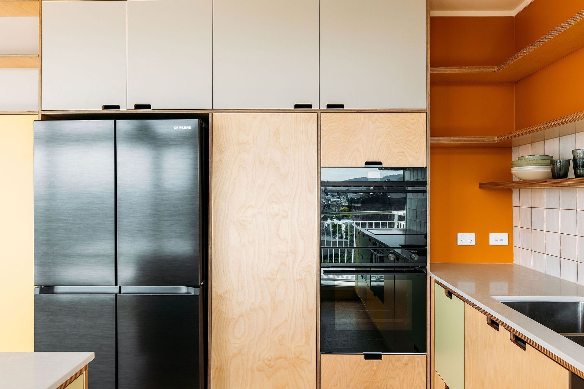 Black appliances were chosen to keep minimal and clean.