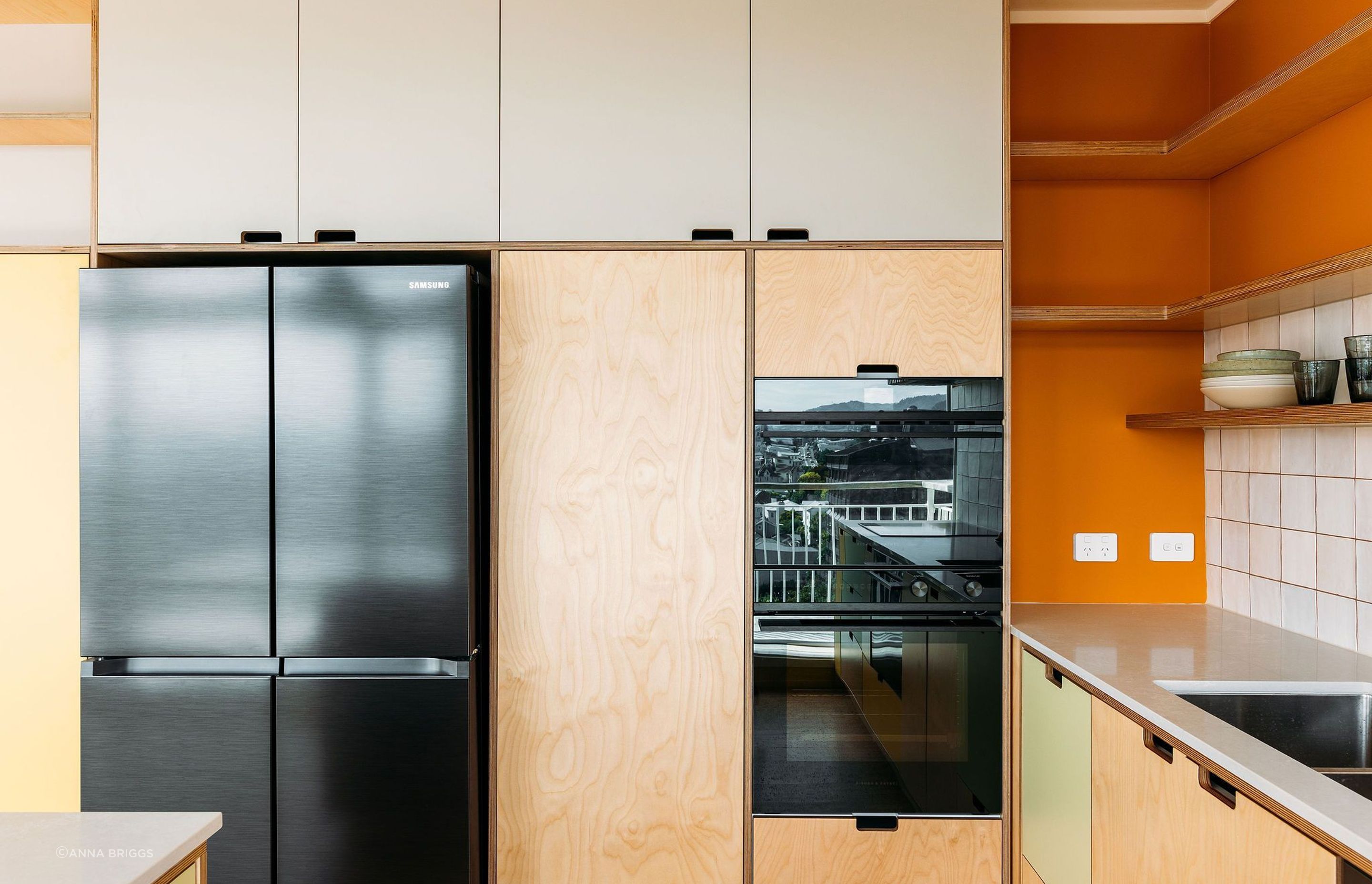 Black appliances were chosen to keep minimal and clean.