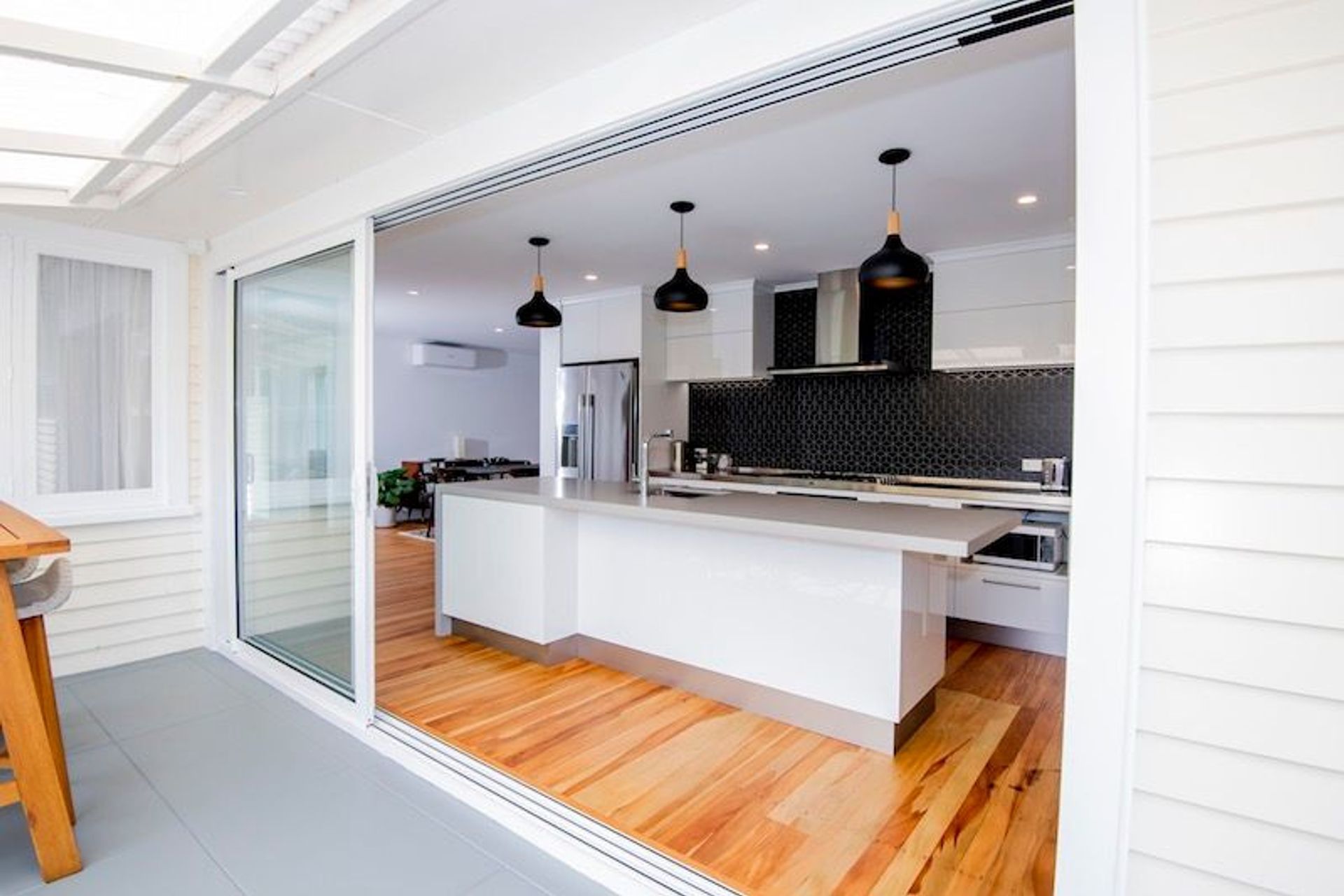 New stacker doors open both ends for easy indoor outdoor flow