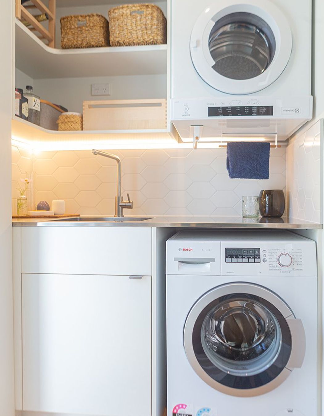 Appliances are neatly integrated to allow ample bench space and access.