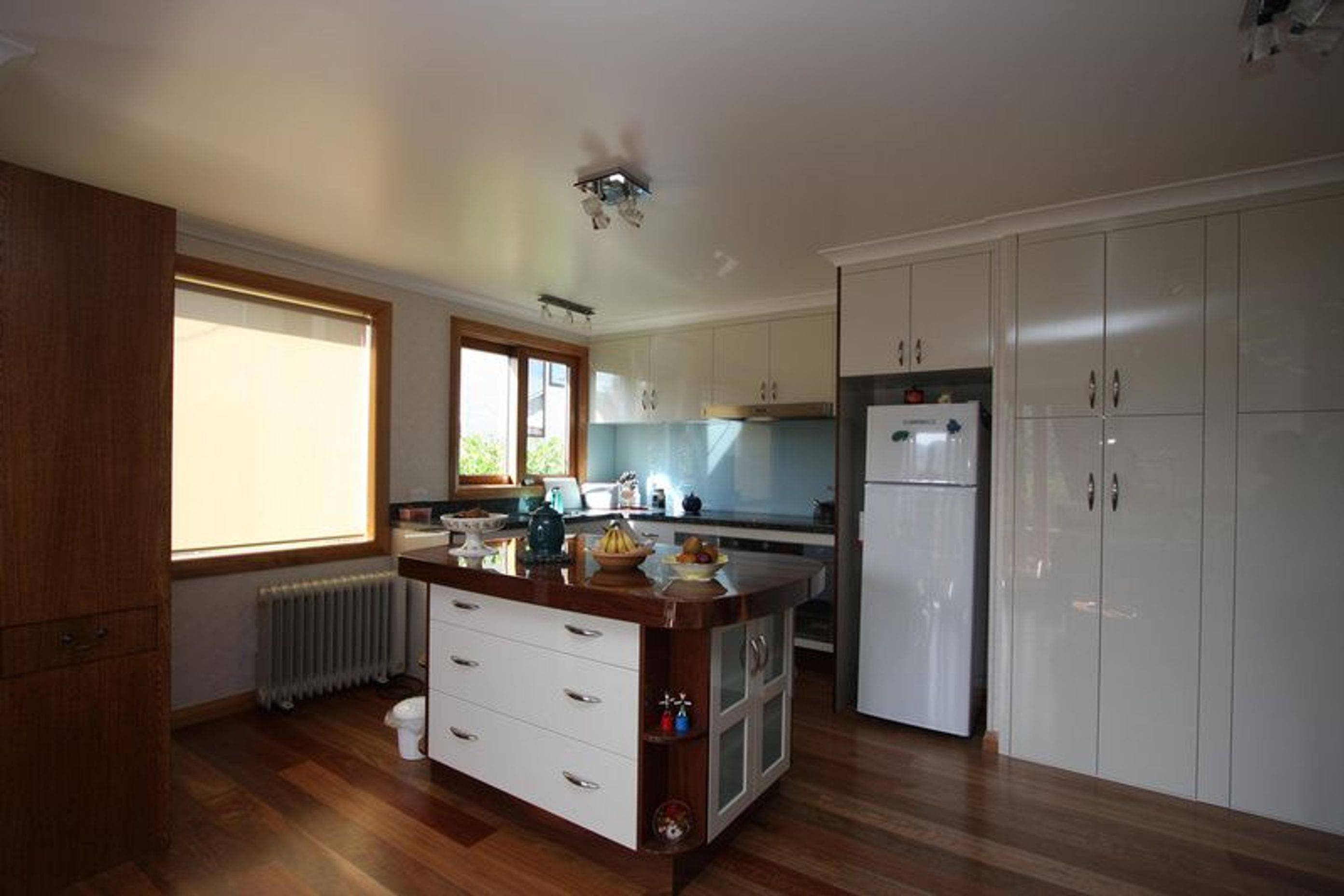 Using white drawers and traditional wood finish