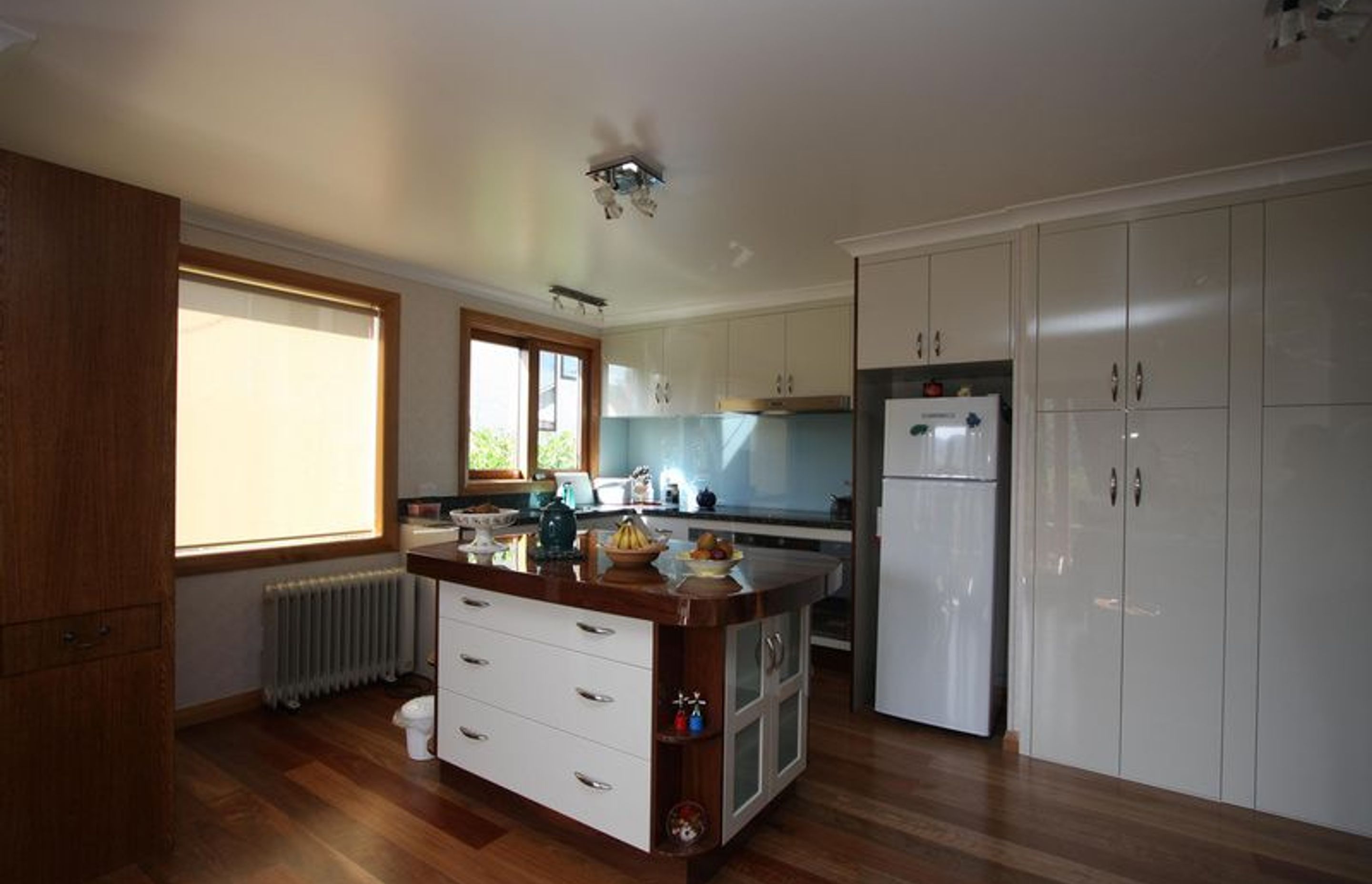 Using white drawers and traditional wood finish